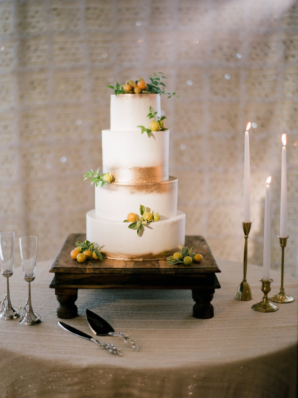 White wedding cake with gold
