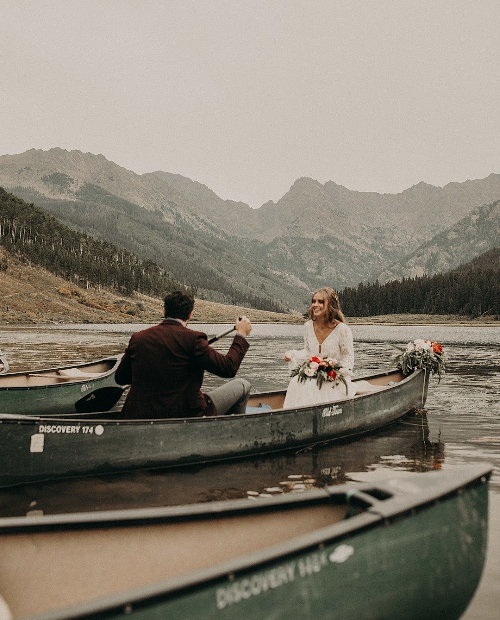 wedding couple in a canoe
