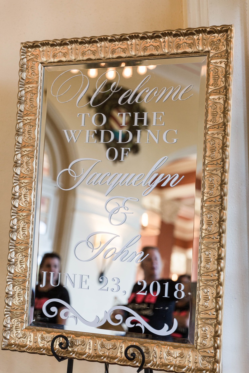 gold framed mirror wedding sign