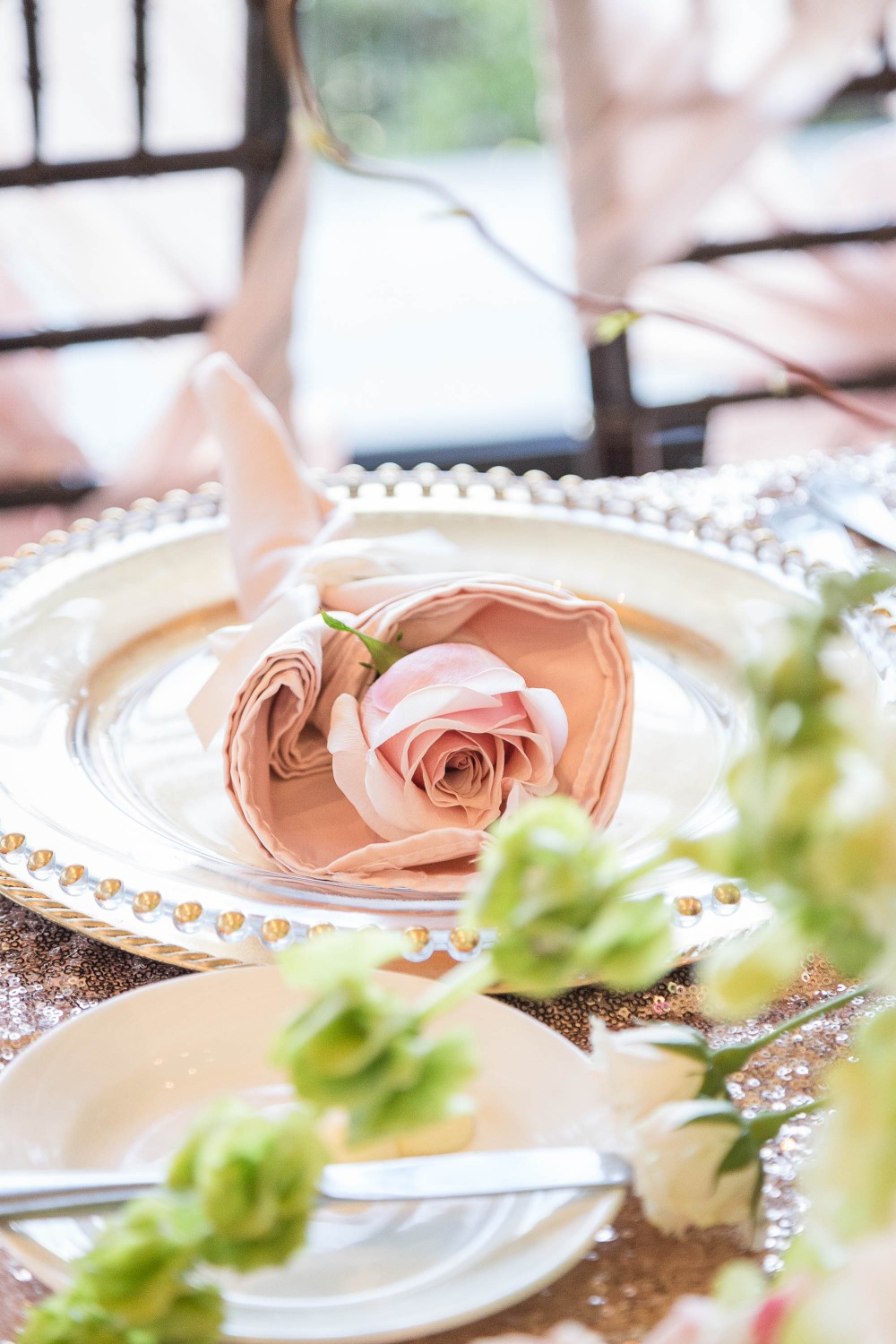 pink rose at every place setting
