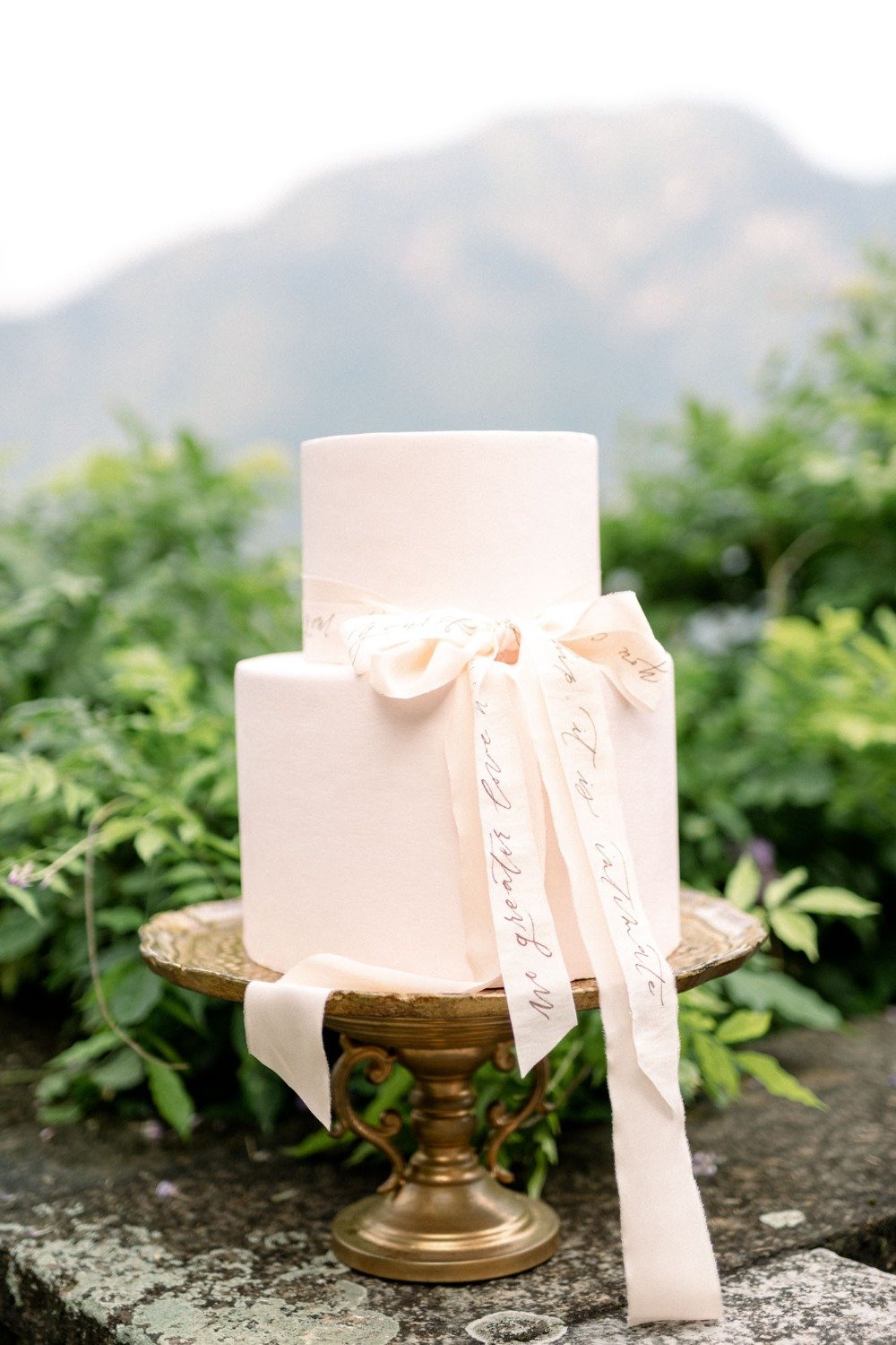 ribbon accented wedding cake