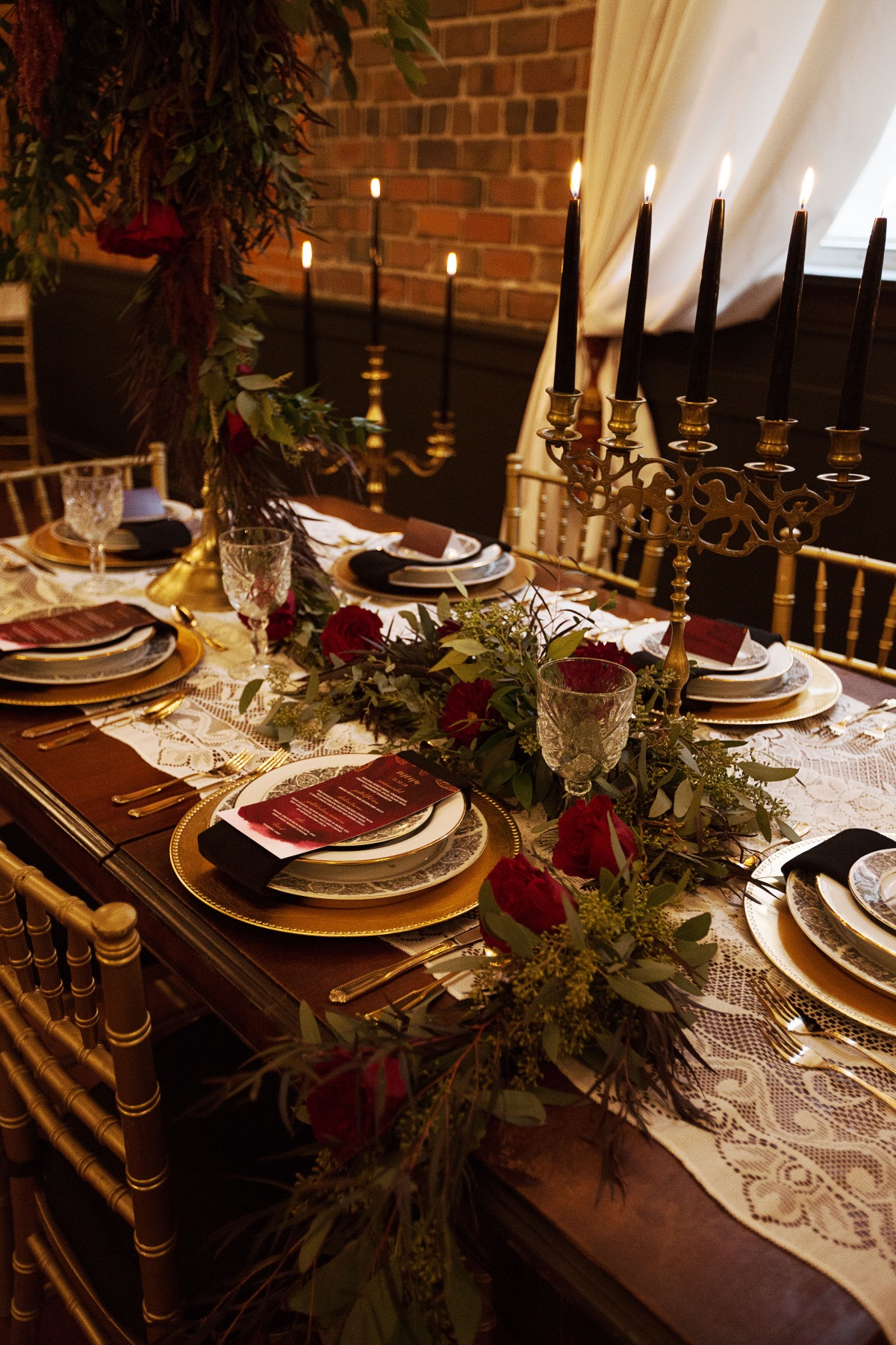 winter season wedding table decor in gold and burgundy