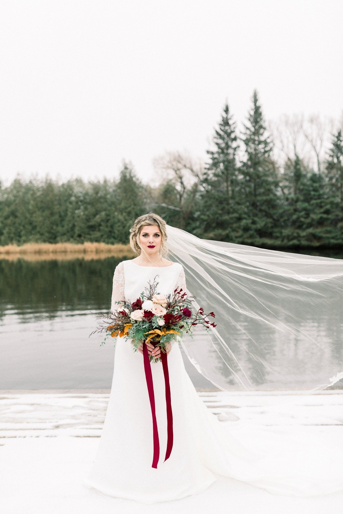 Winter bride with deep red hues