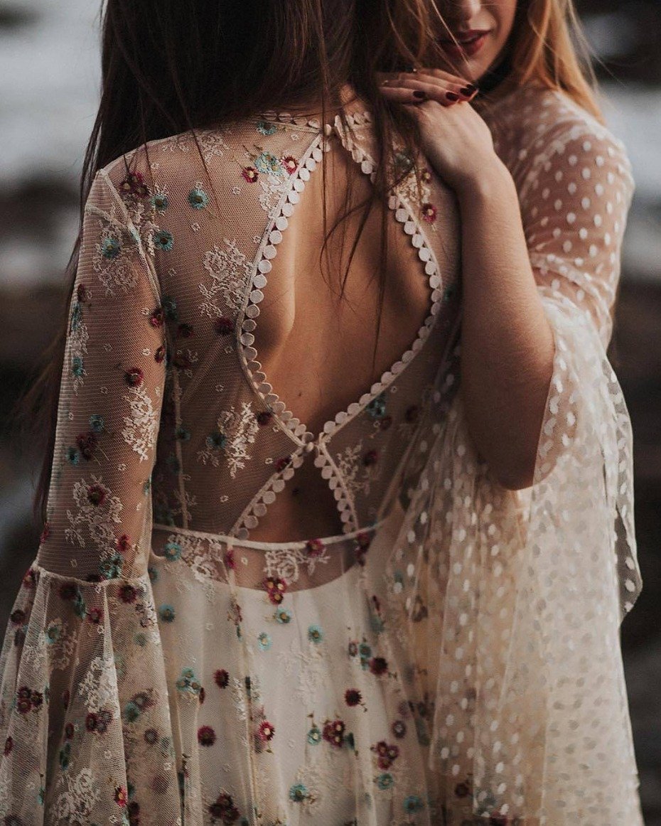 Floral embroidery and polka dot embroidery on wedding gowns