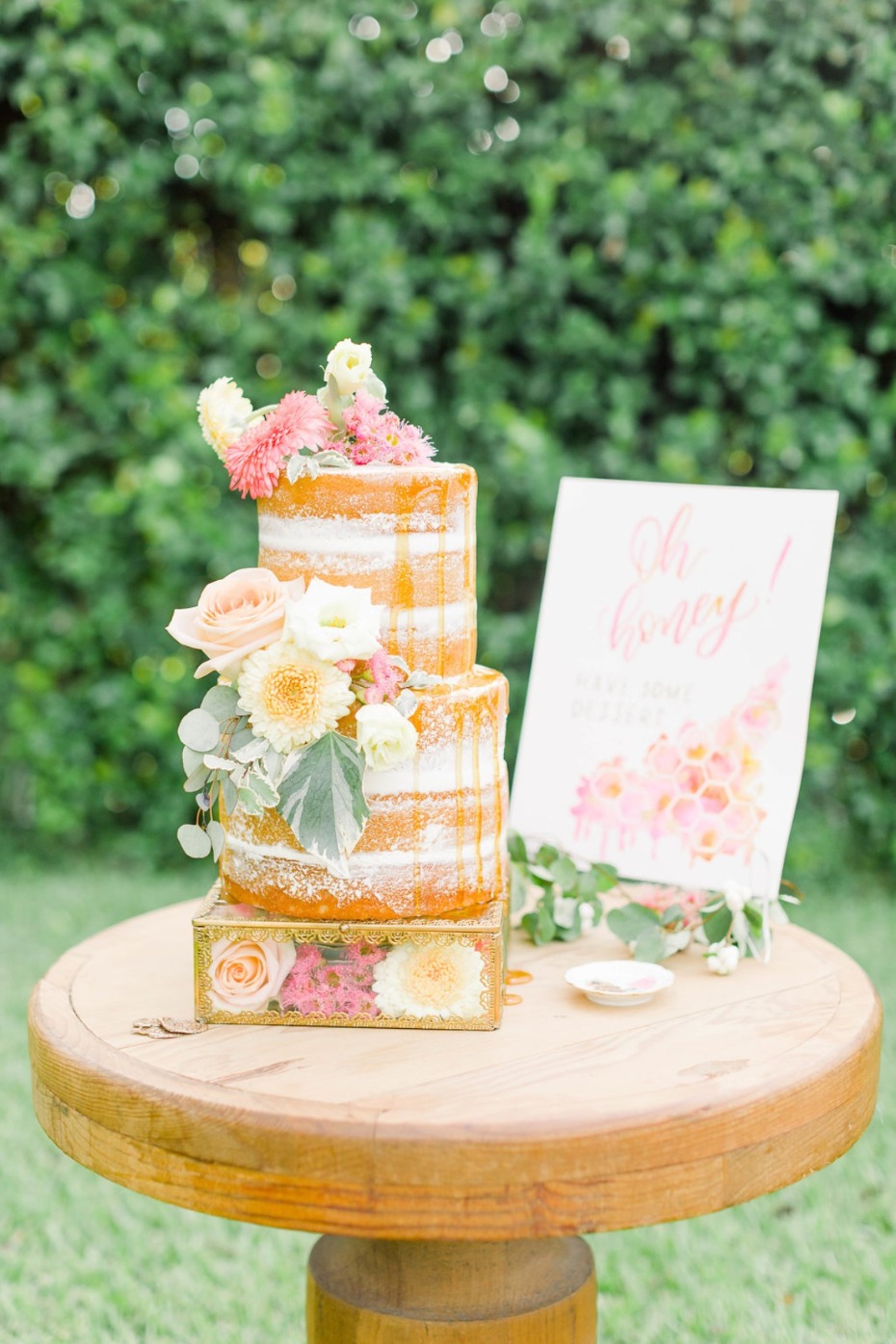 naked wedding cake with honey drizzle