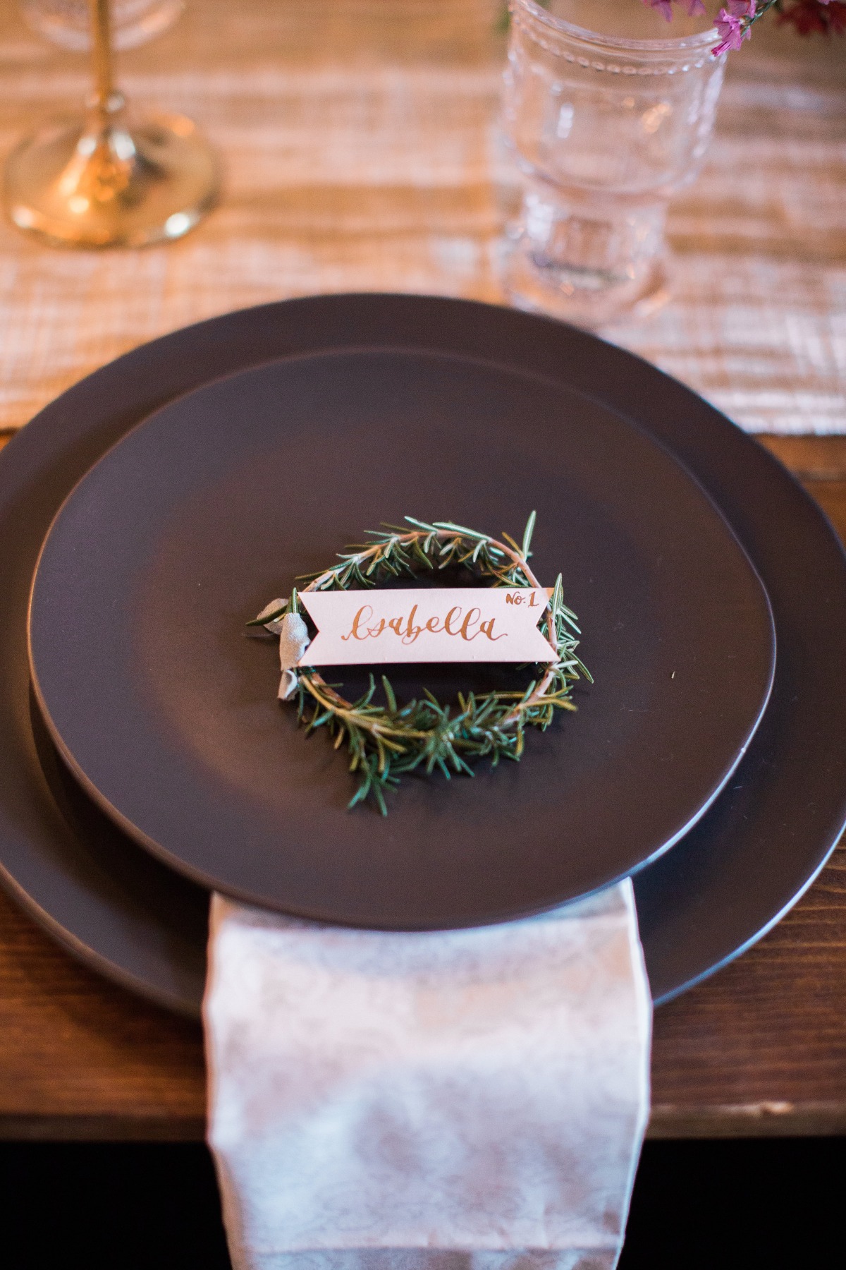 Elegant place setting with Isabella name card and rosemary wreath