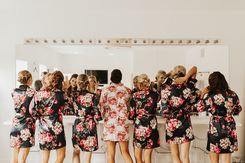 Bride and bridesmaids getting ready in robes