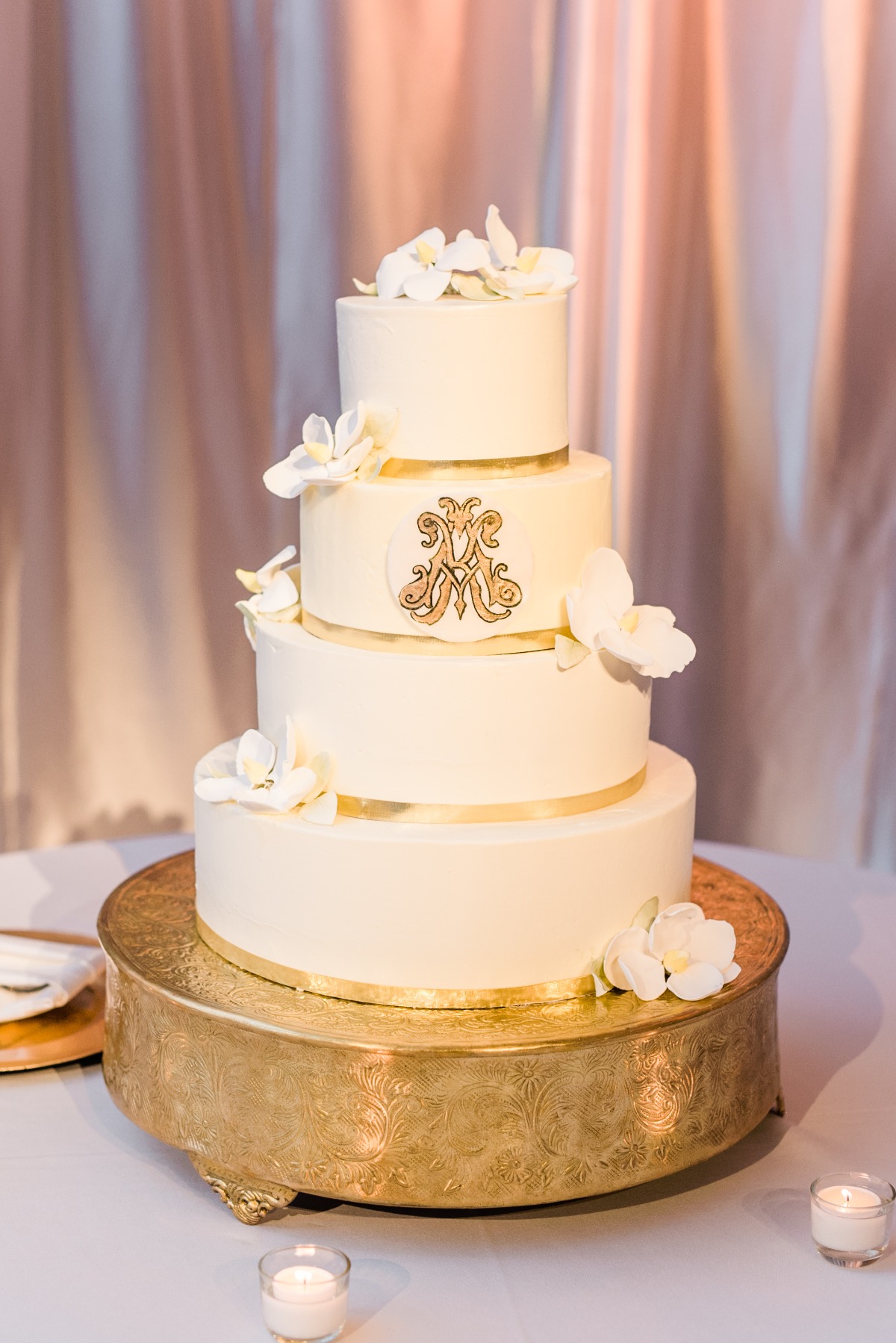 White monogramed wedding cake