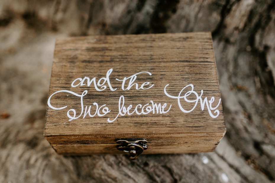 Wooden box with the words and the Two become One inscribed
