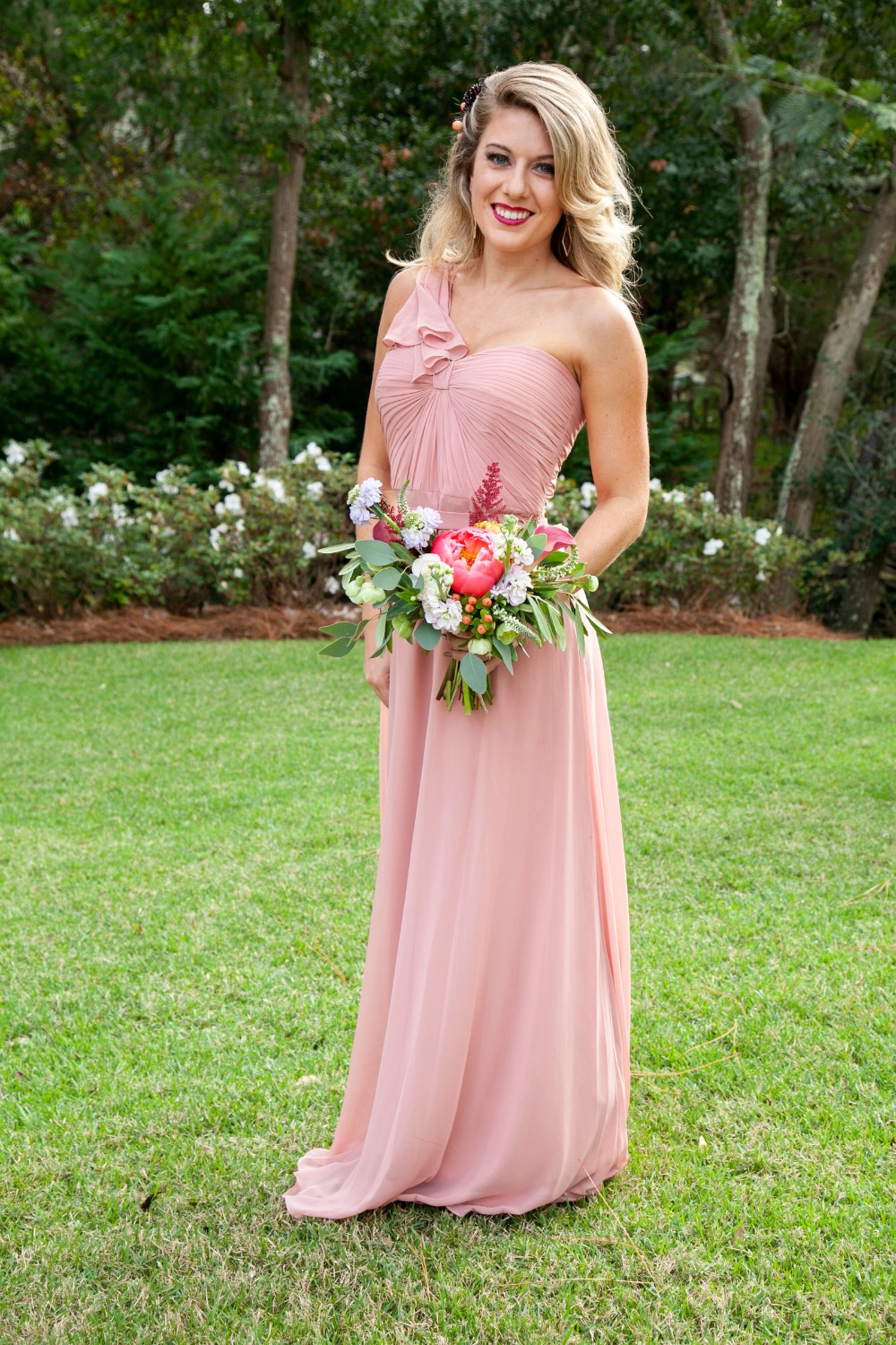 bridesmaid in single shoulder pink dress
