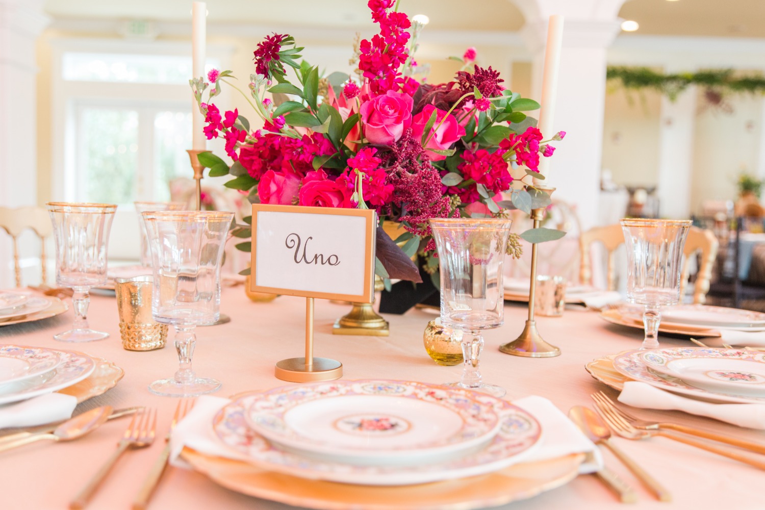 gold and bright pink wedding table