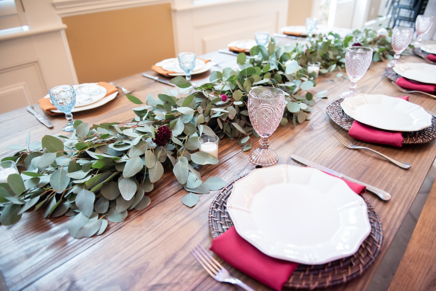 wedding table decor with eucalyptus garland