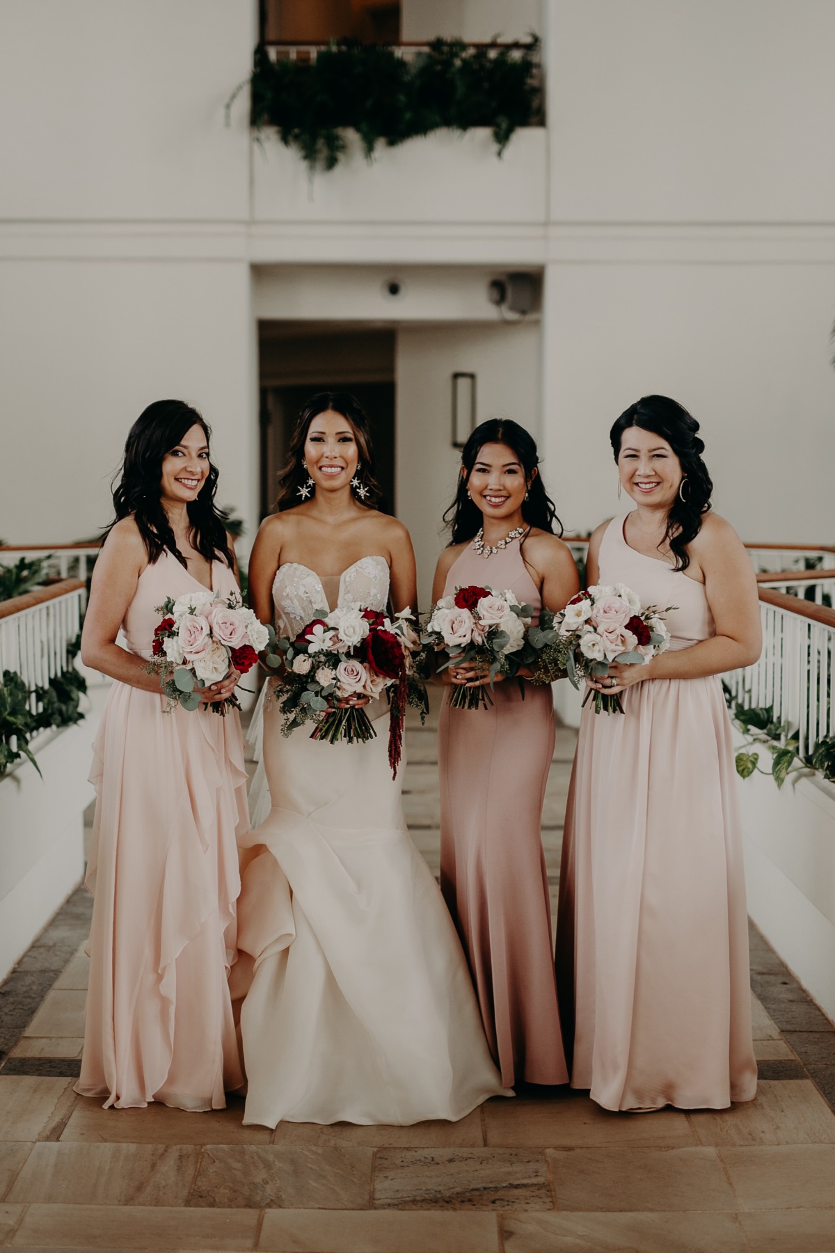bridesmaid in assorted blush dresses