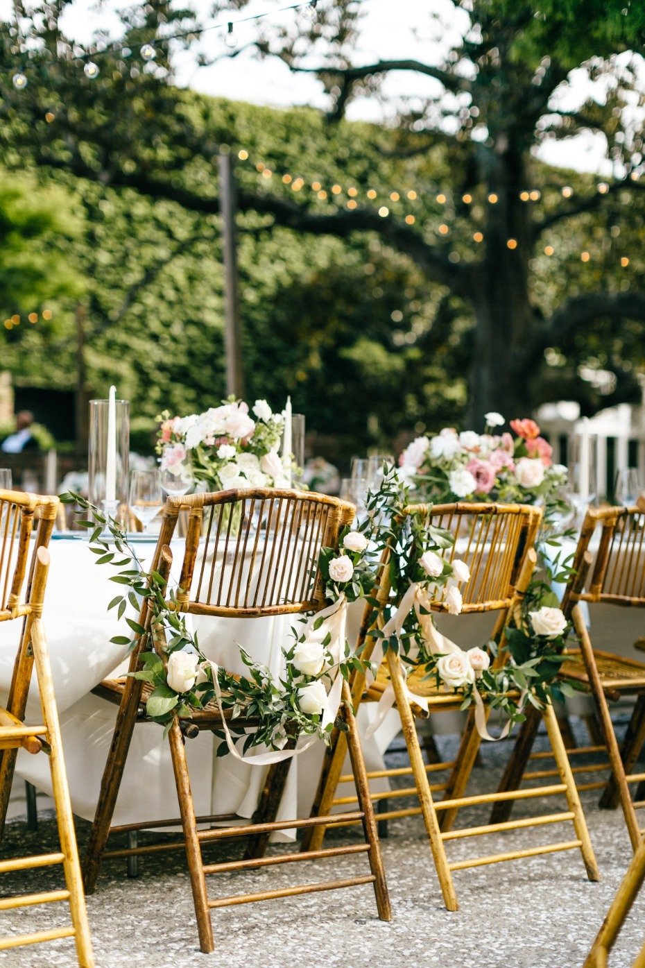 Wedding chairs covered in flowers