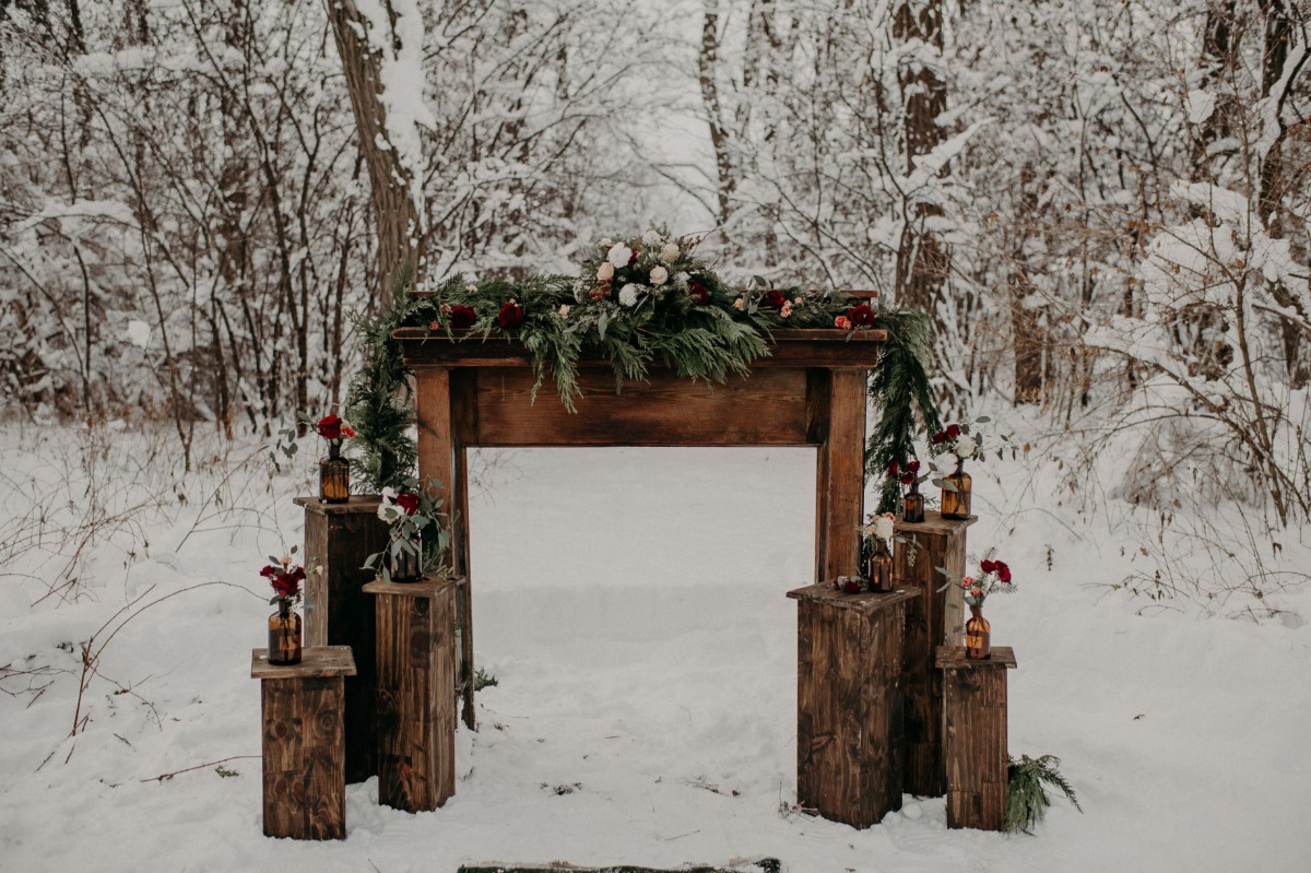cozy winter wedding ceremony backdrop