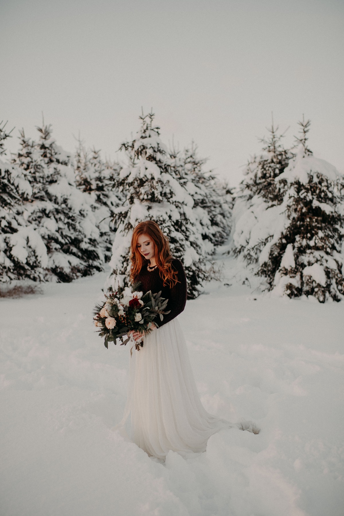 cozy bridal look in the snow