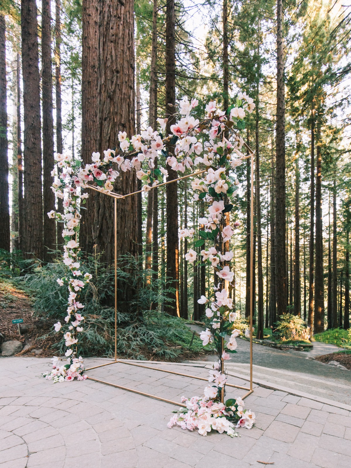 Redwoods ceremony arch with silk magnolias