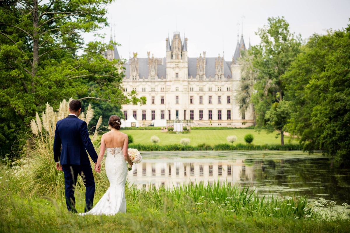 Bride and groom at chateau wedding venue in France