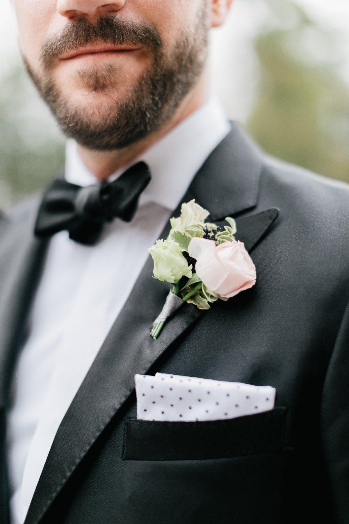 Pink rose boutonniere