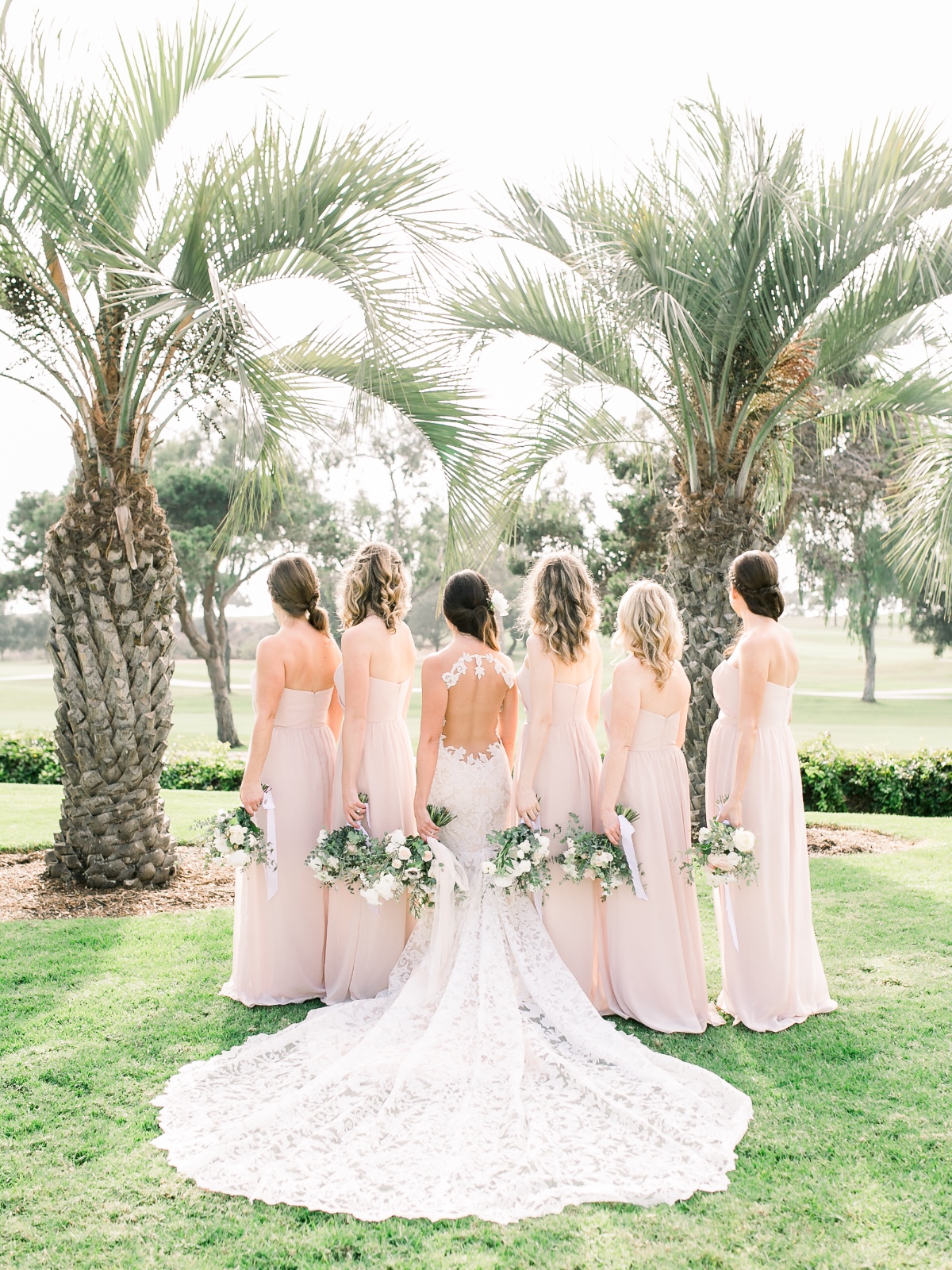 Blush bridesmaid dresses and Ines Di Santo wedding dress
