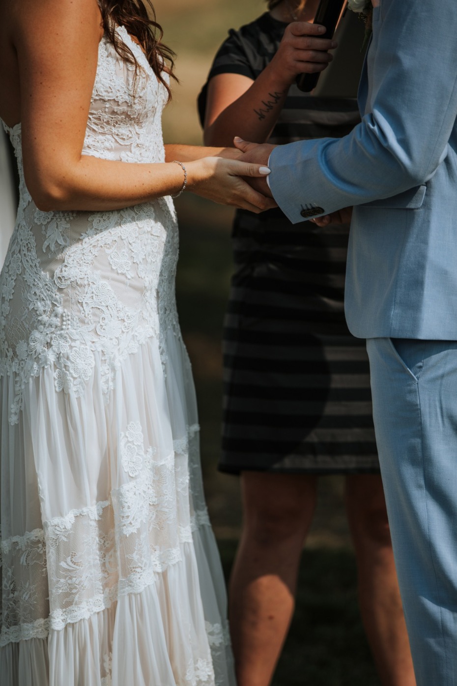 Bride and groom exchanging vows at wedding ceremony