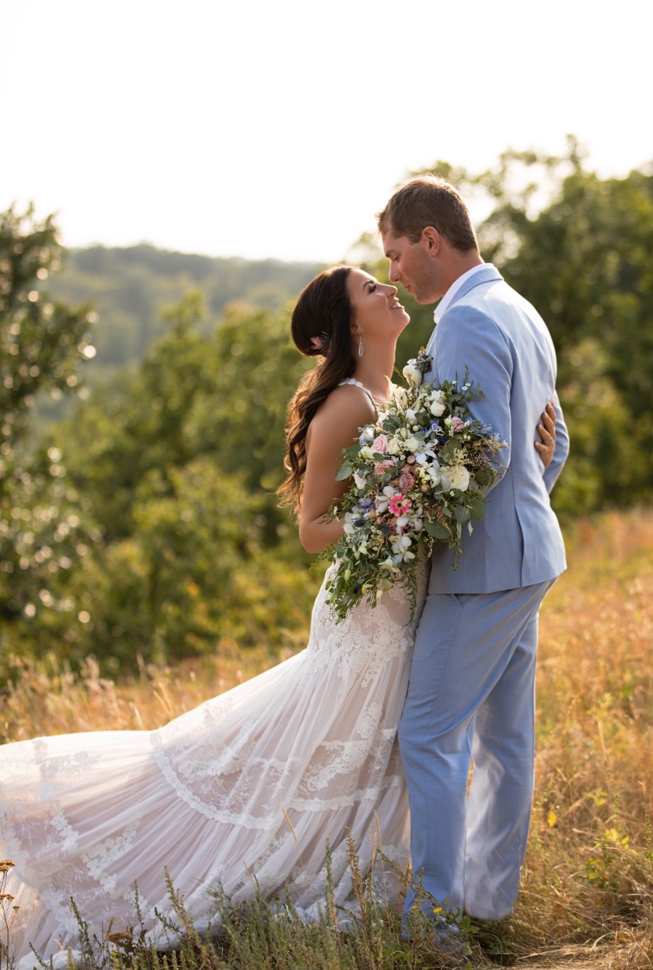 Happy bride and groom in love on their wedding day outdoor