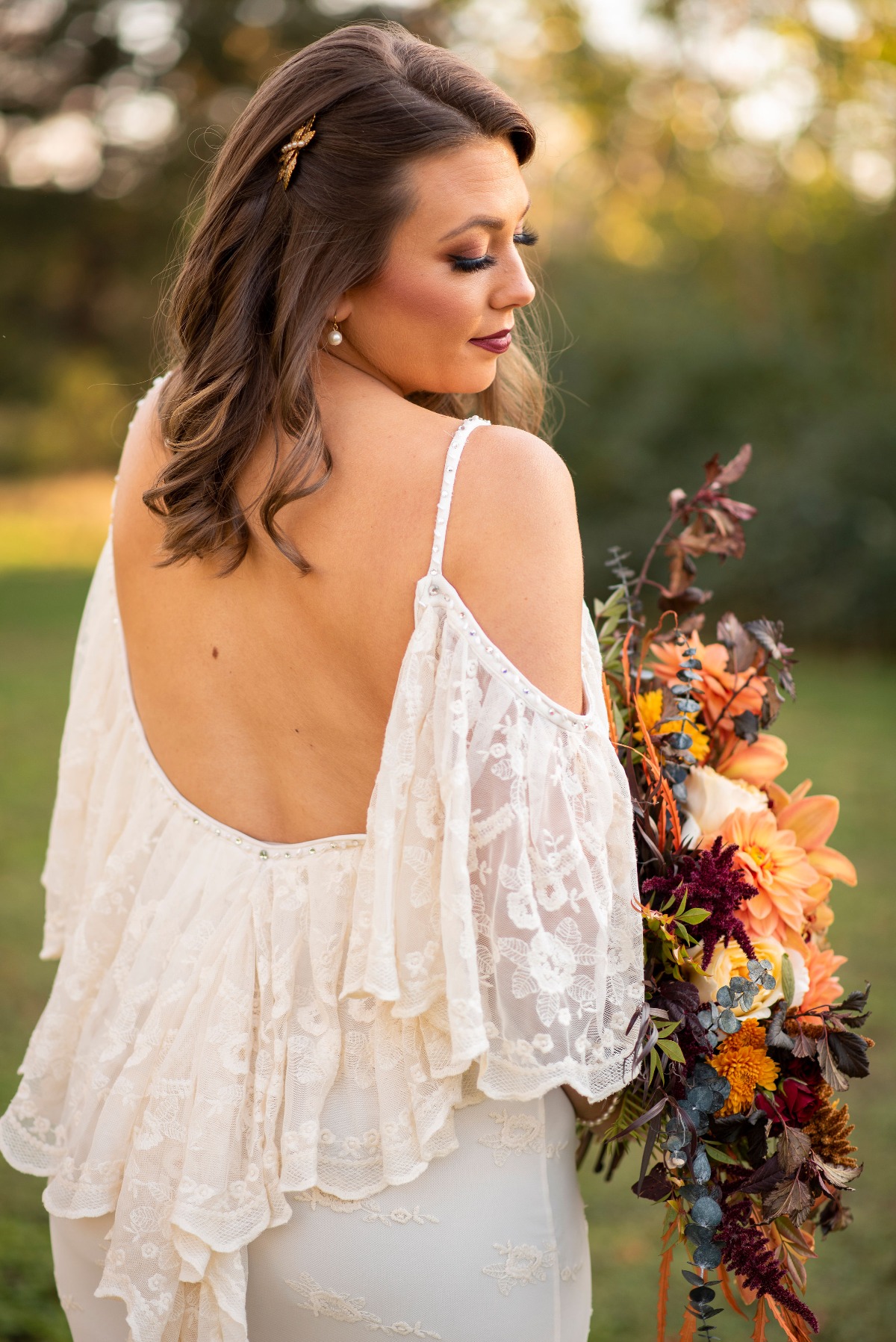 Lace boho wedding dress from Miss Madison Couture Boutique