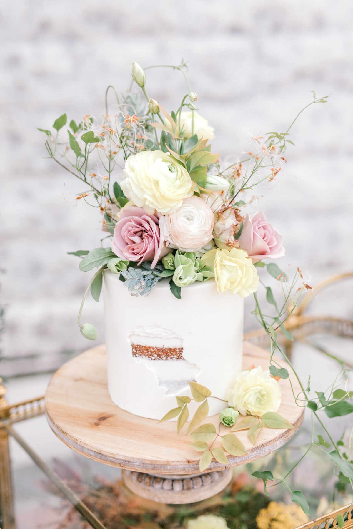 romantic floral topped wedding cake