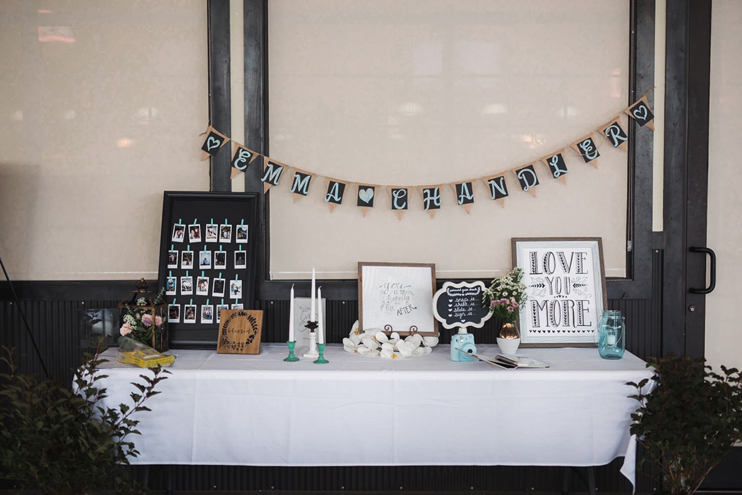 Wedding reception table decor with Emma and Chandler banner