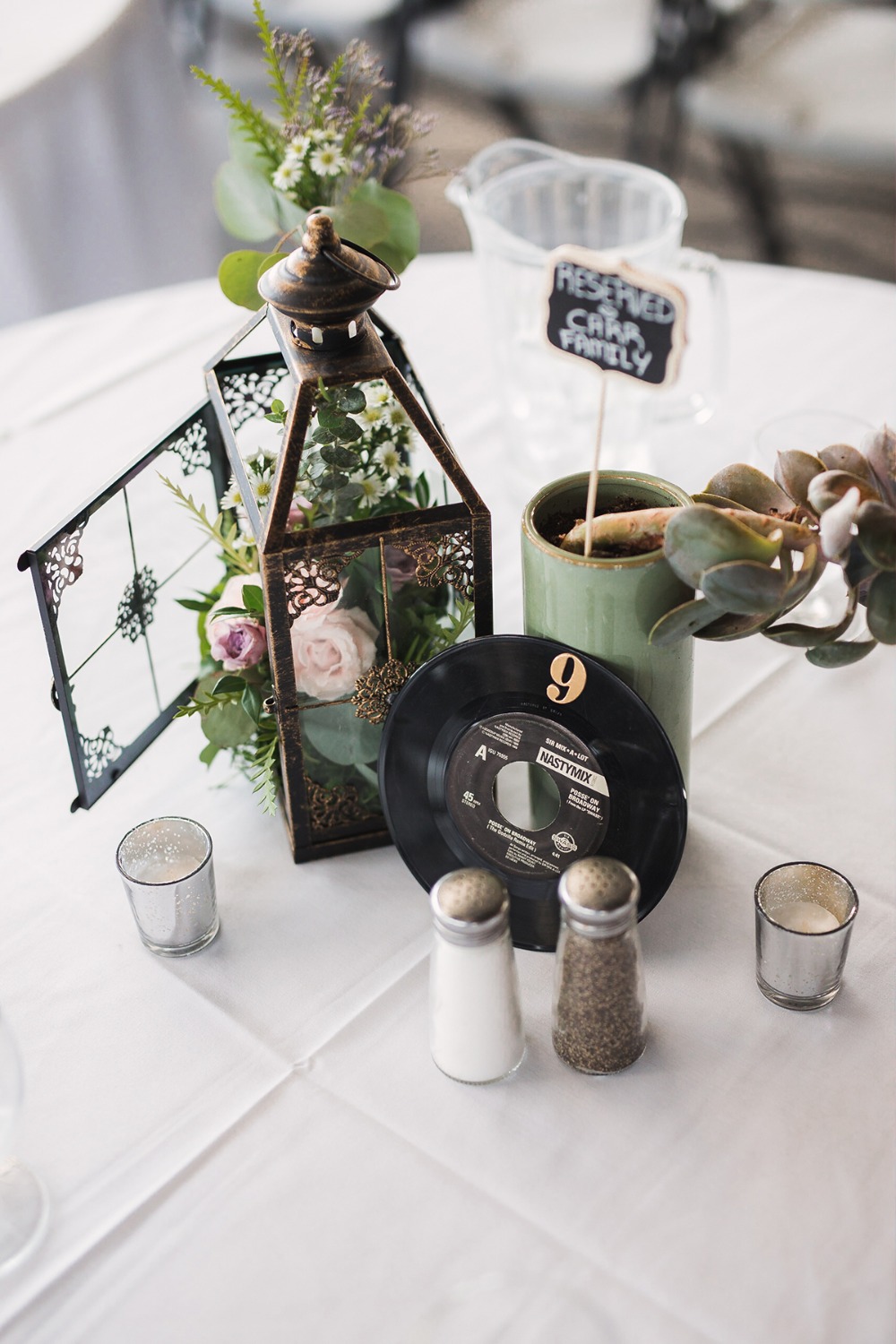 flower lantern and record wedding centerpiece
