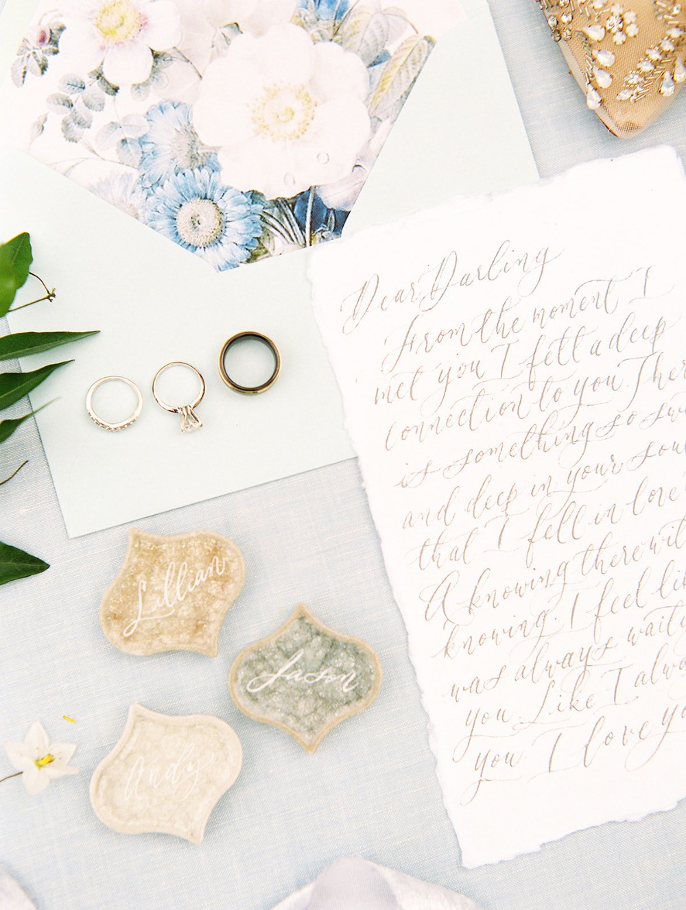 Romantic wedding stationery with rings and place cards