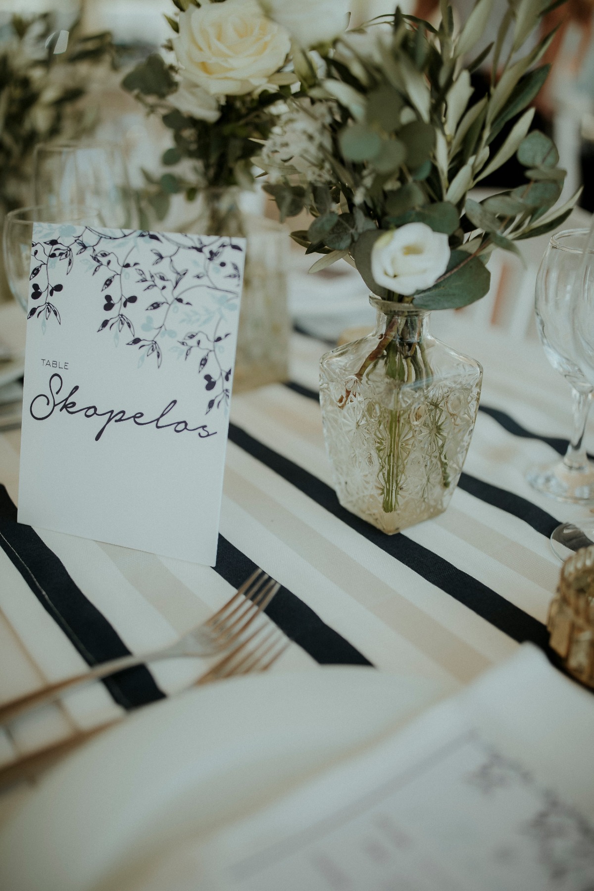 Elegant Skopelos wedding table with floral centerpiece