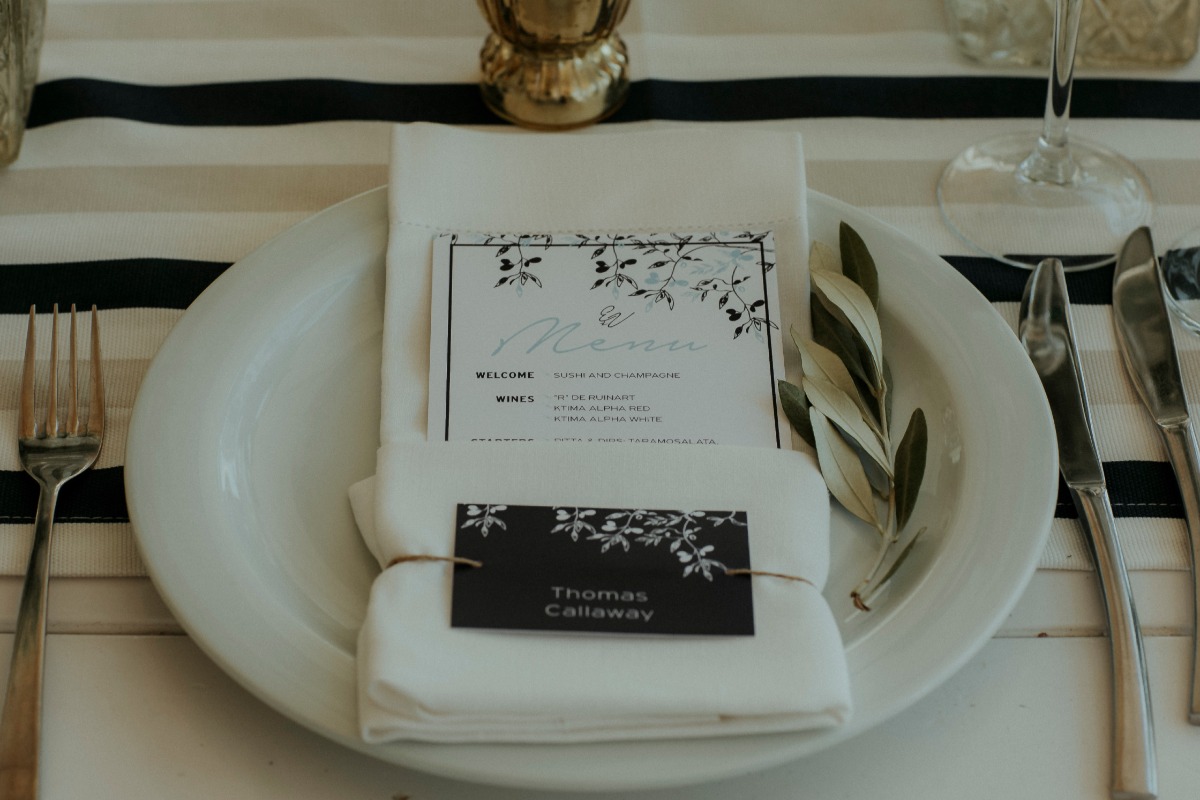 Elegant wedding place setting with menu and name card