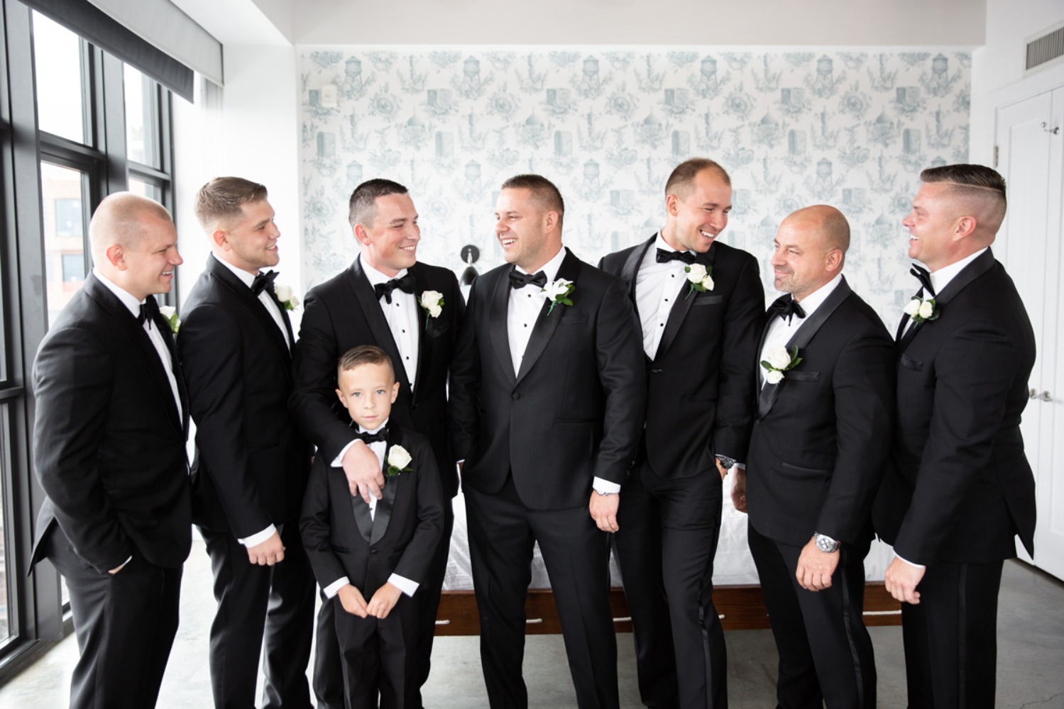 groom and his men in classic tuxedos