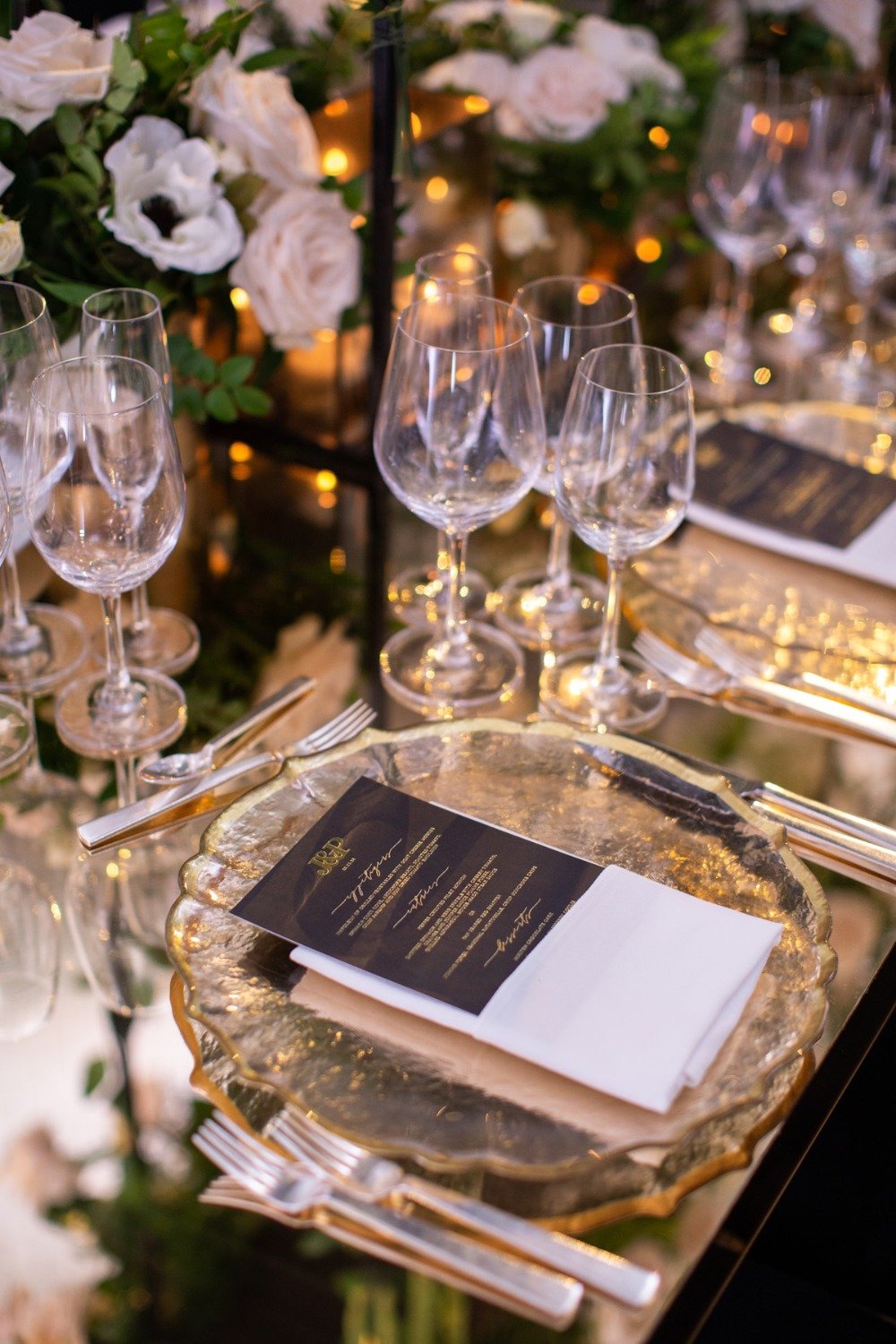 gold and black wedding place setting