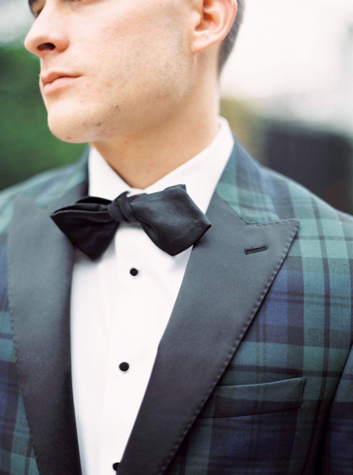 Plaid suit and bow tie