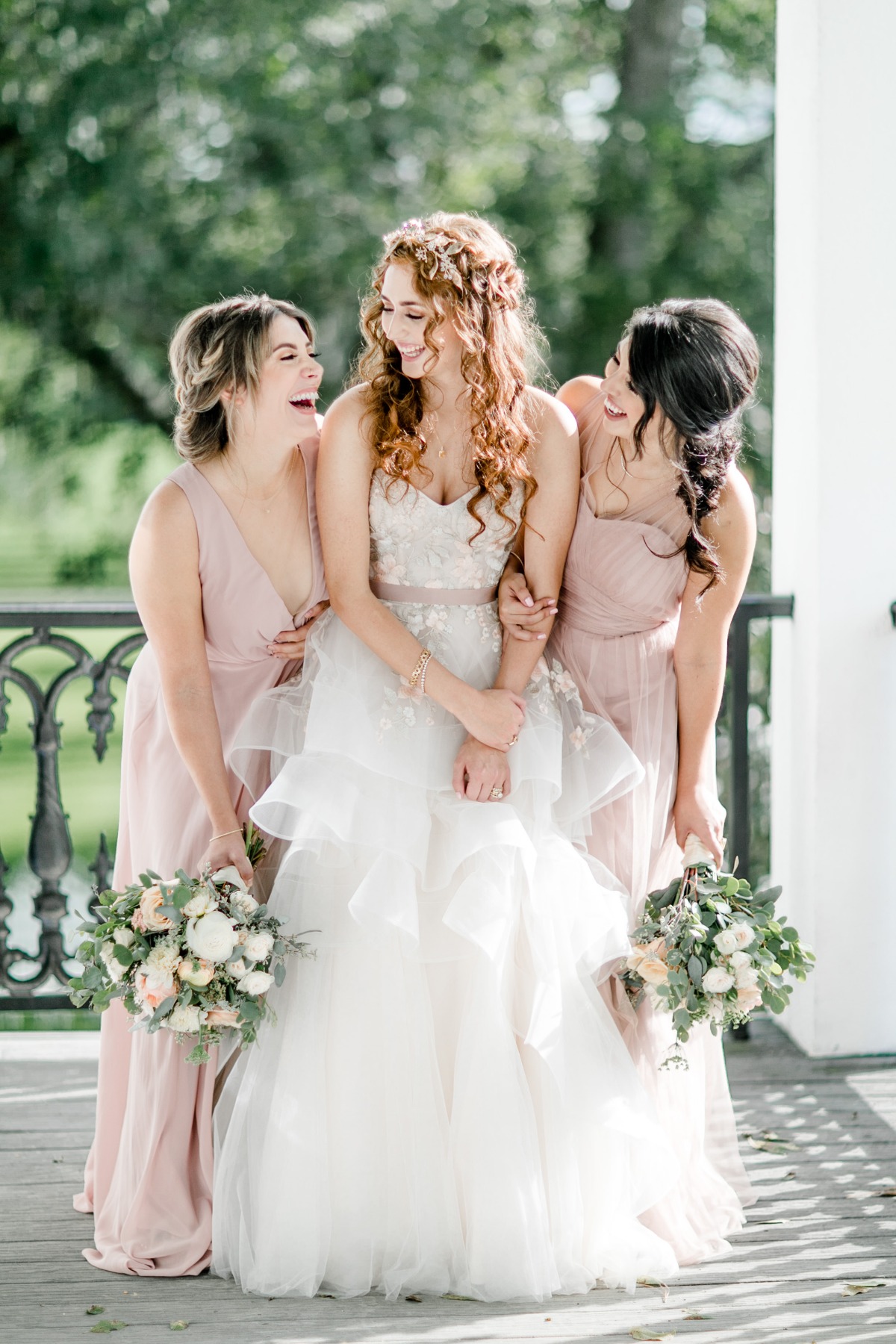 sweet bride and bridesmaids in dusty rose