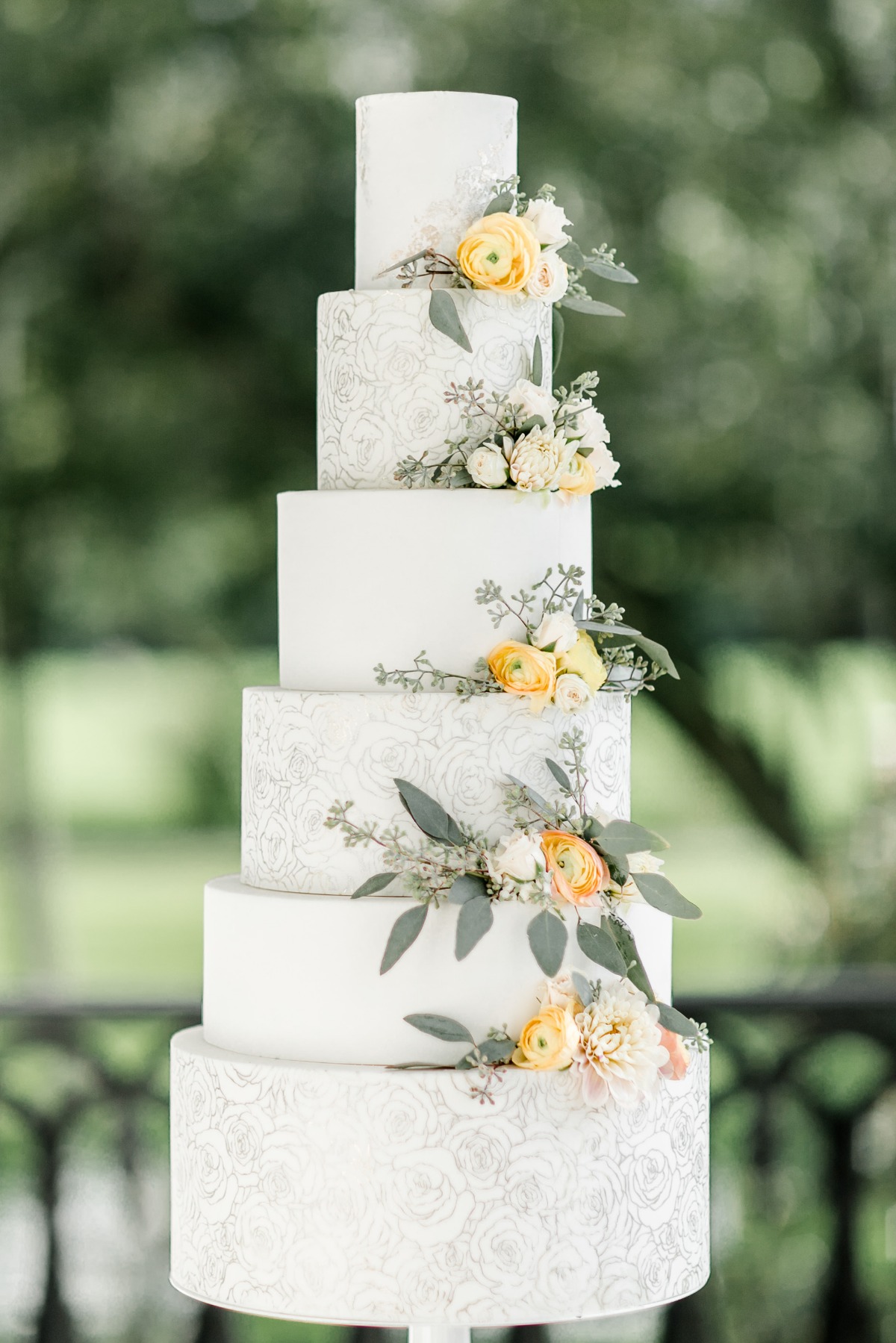 white and silver wedding cake