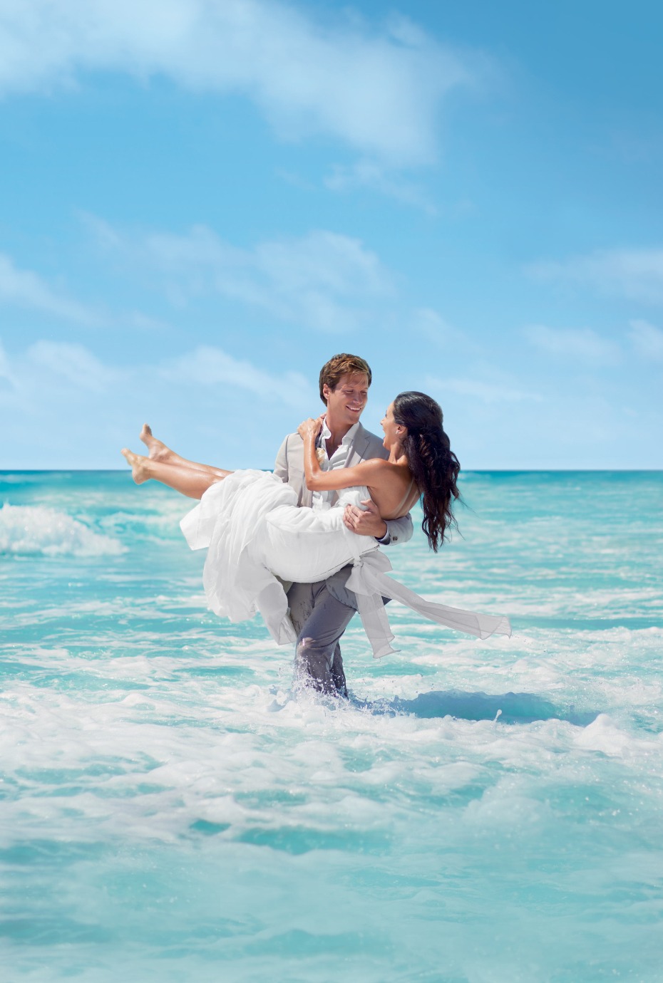 Palace Resorts Couple Taking Pictures in the Ocean