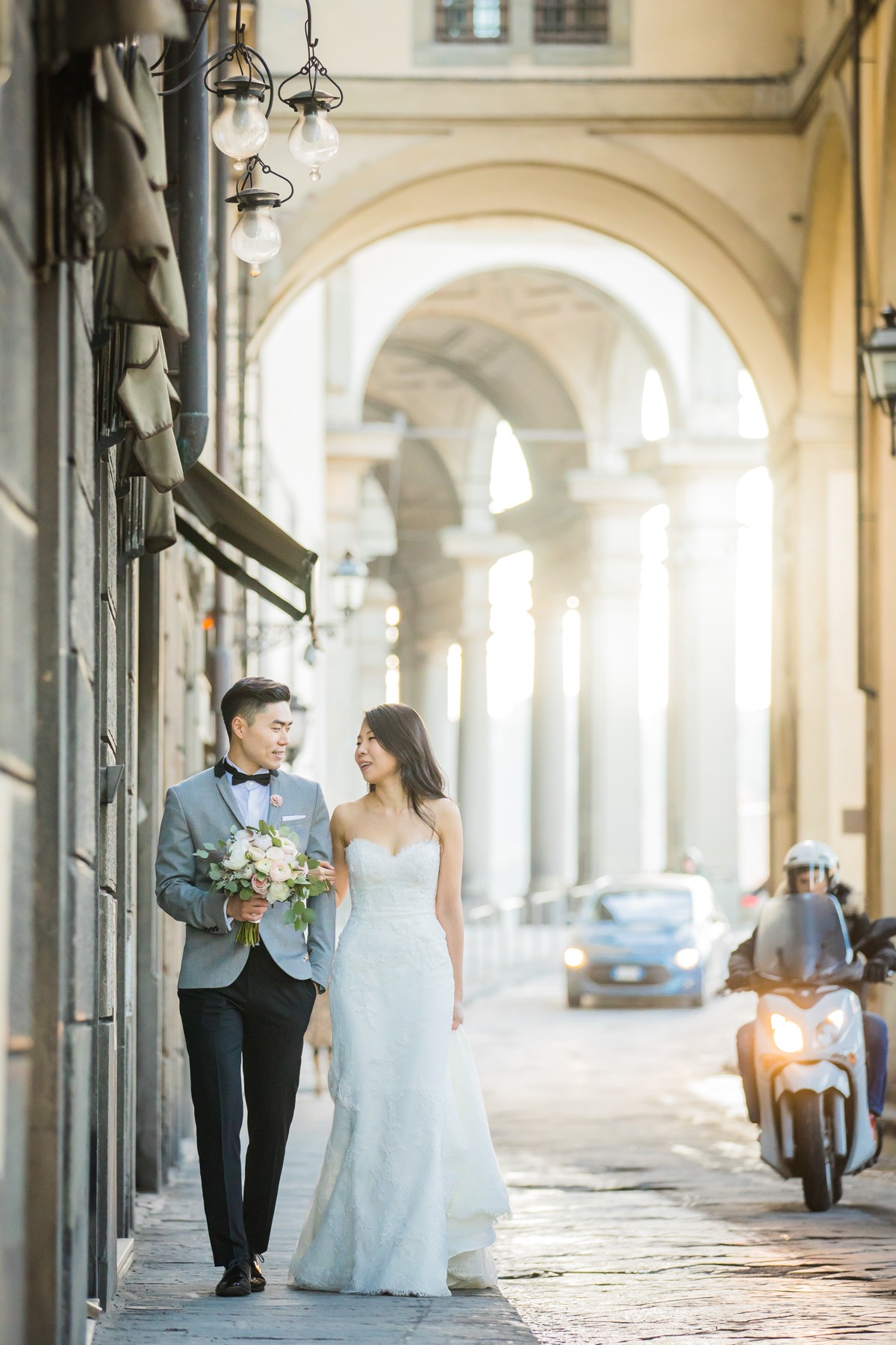 Elegant couple walking together on their wedding day