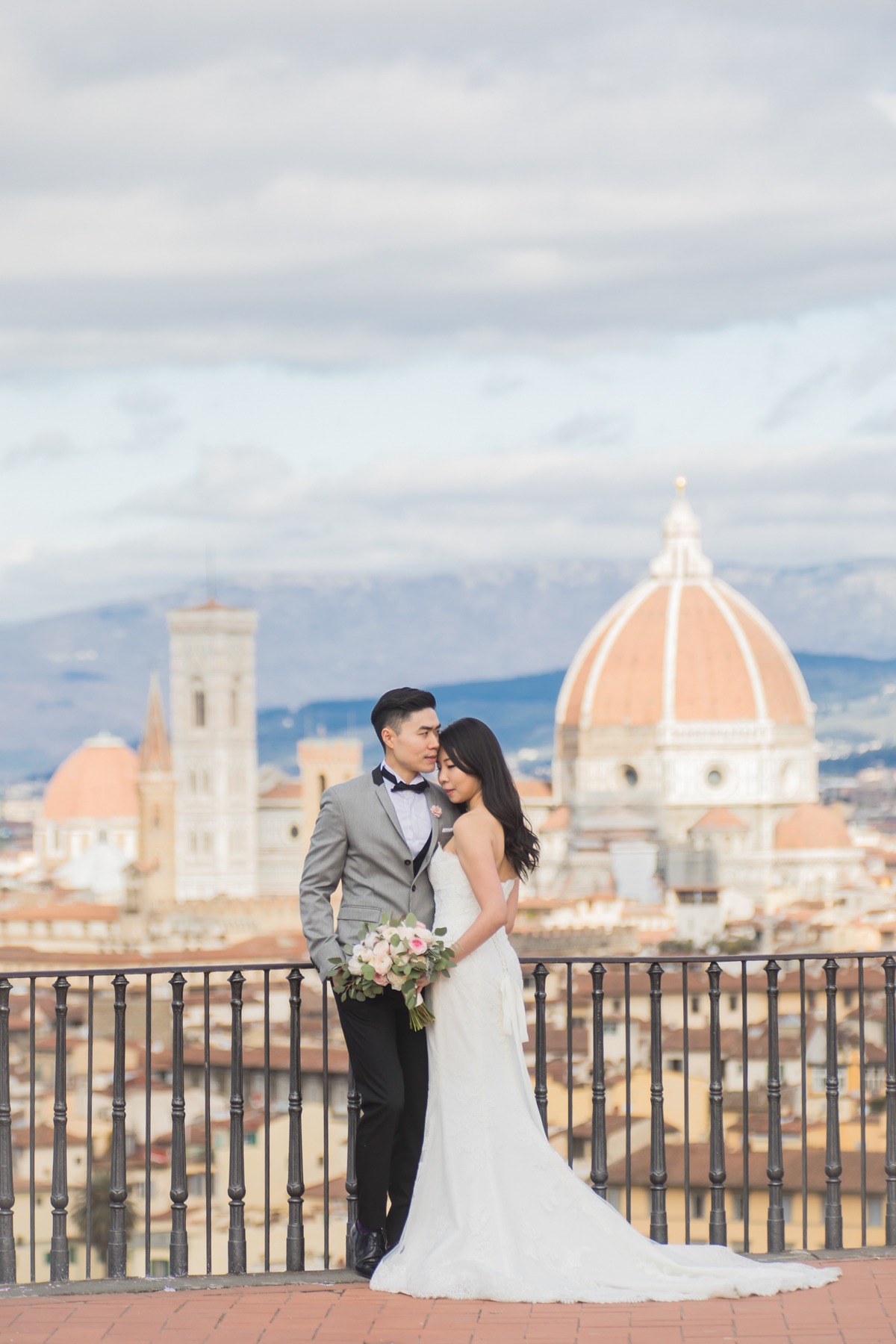 Elegant wedding couple in Florence, Italy with iconic Duomo
