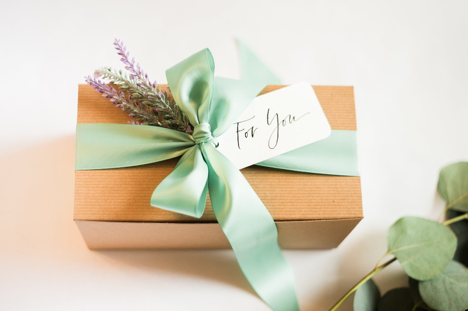 Gift box with mint ribbon and For You tag