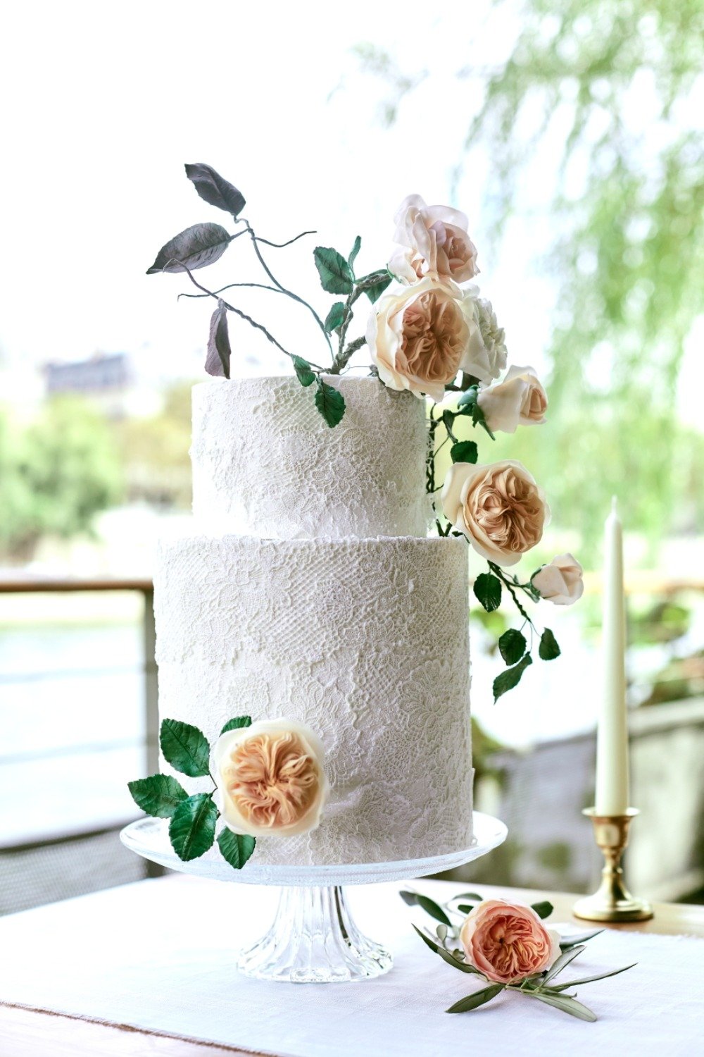Lace wedding cake with florals
