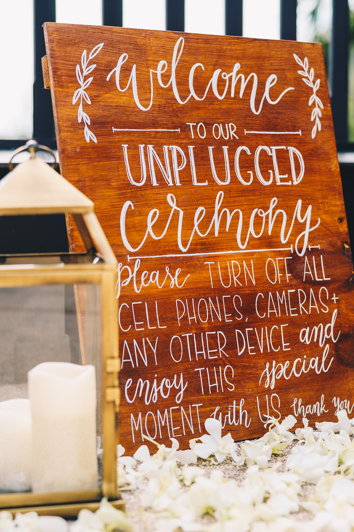 Wooden unplugged wedding ceremony sign with white lettering