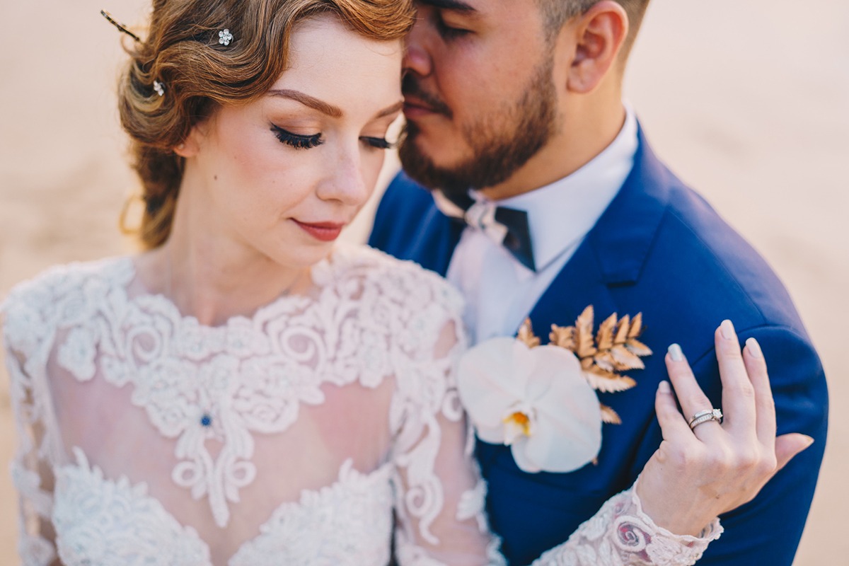 Romantic wedding photo of bride and groom, close embrace
