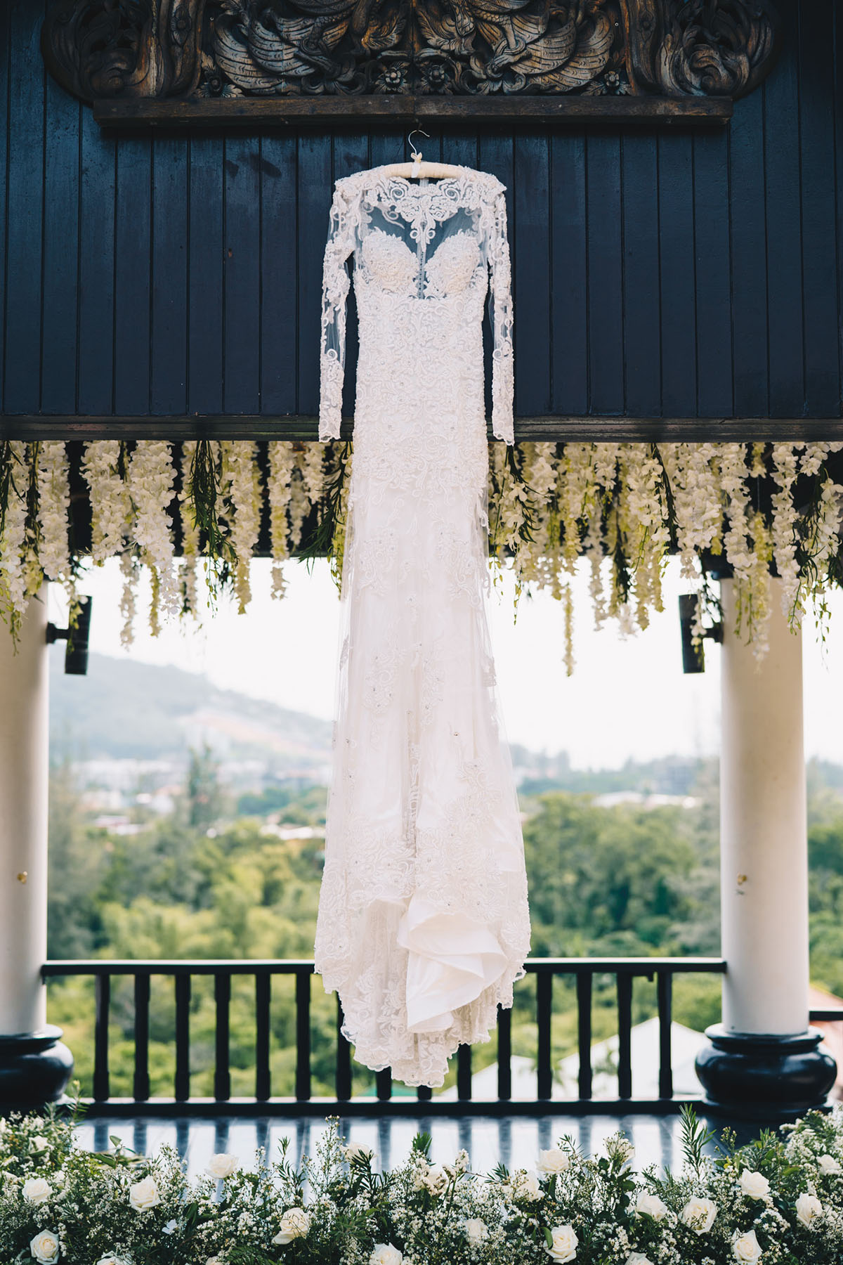 Elegant wedding dress hanging, awaiting the special day