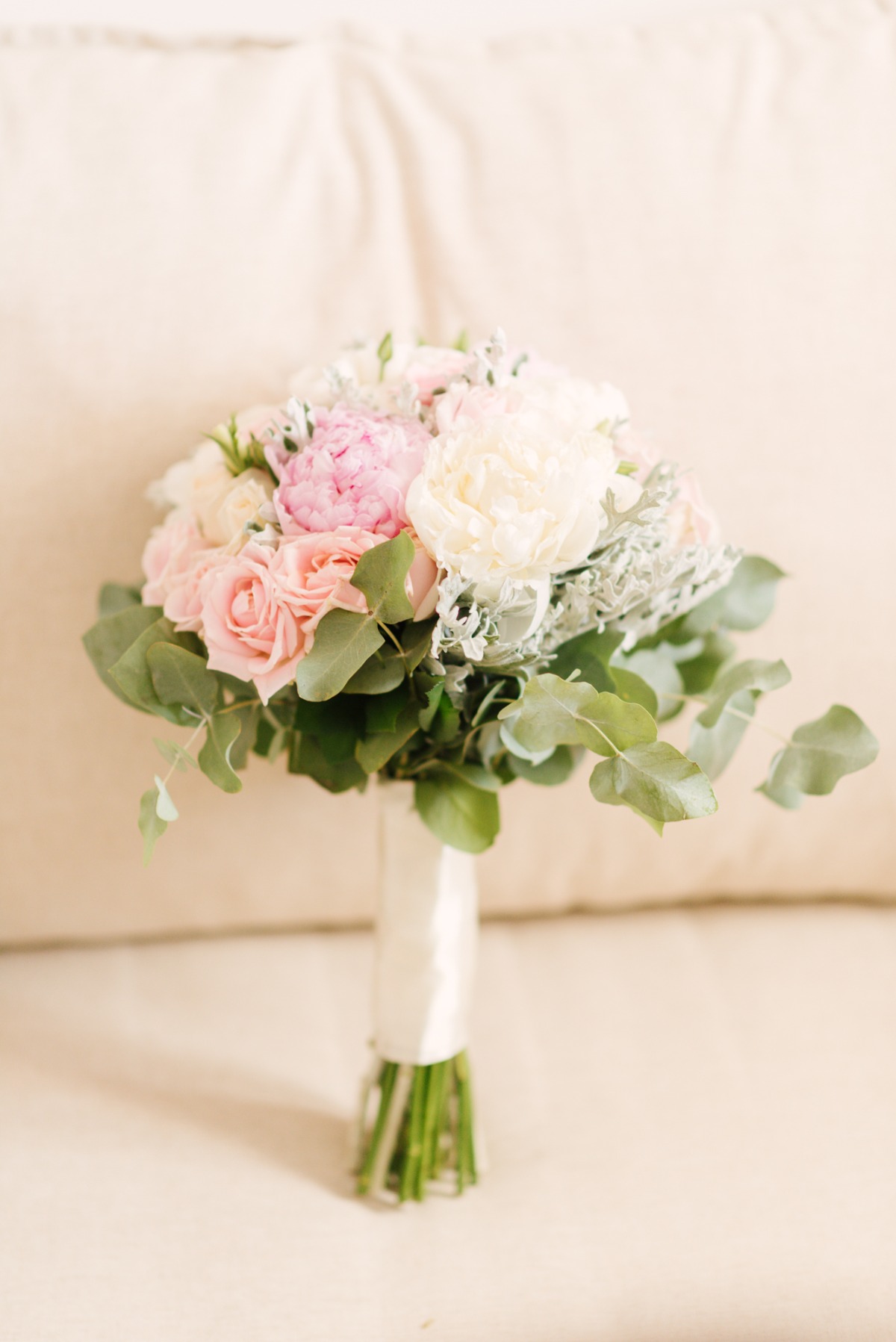Elegant pink and white bridal bouquet with eucalyptus