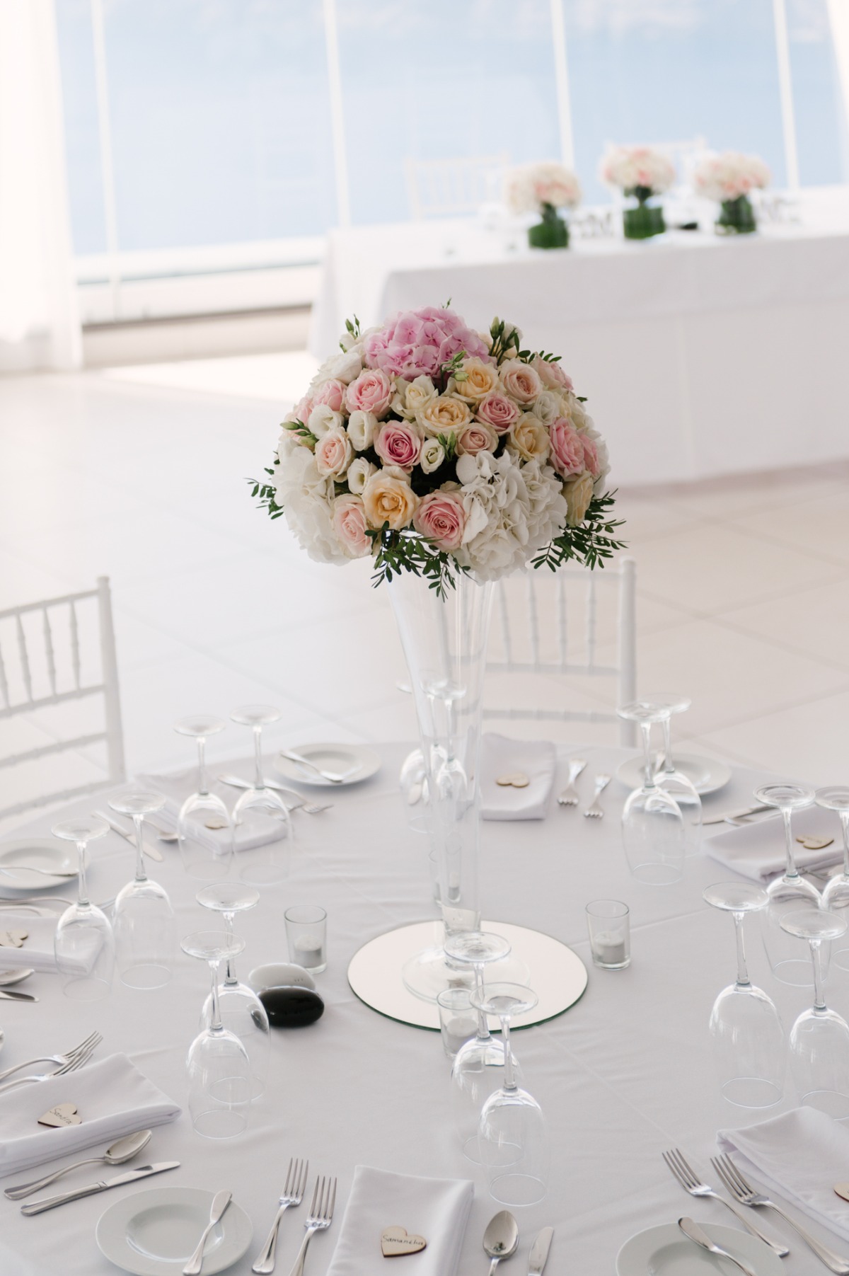 Elegant wedding table setting with a stunning floral centerpiece