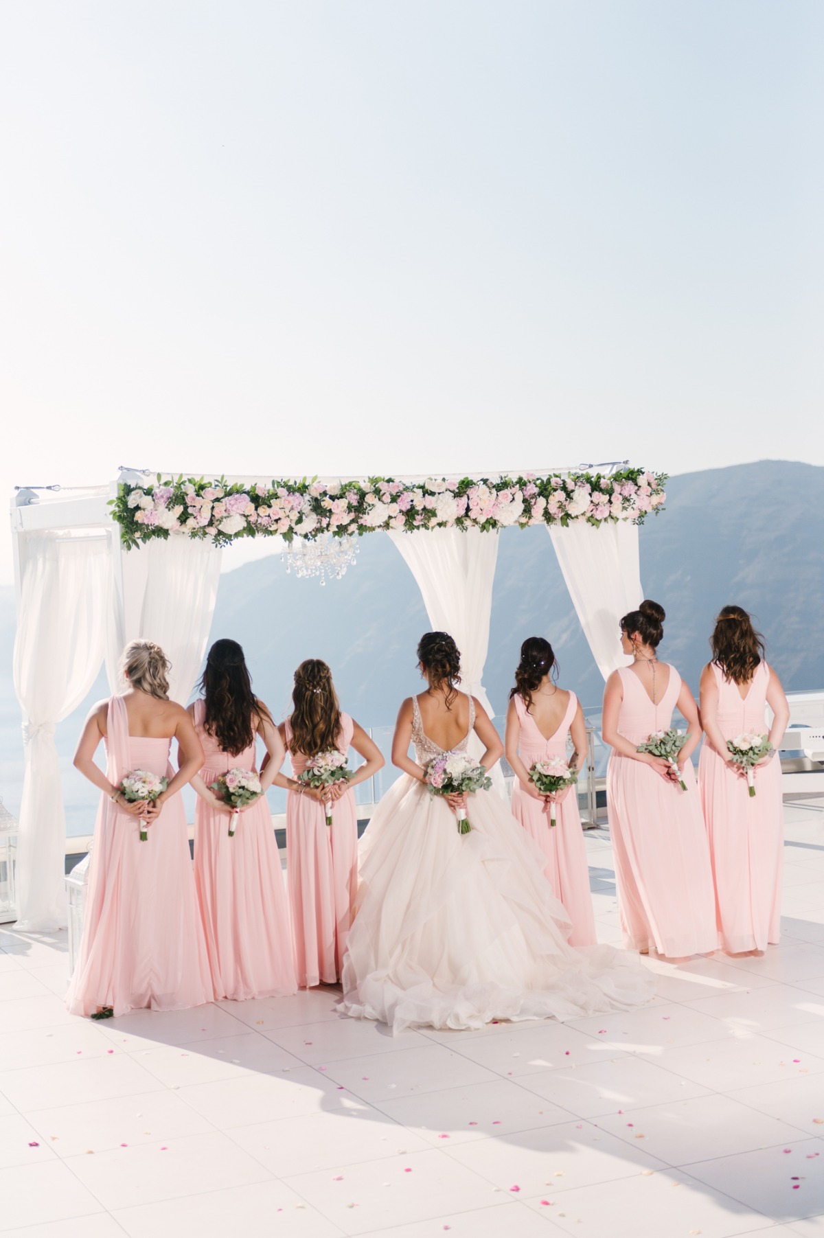 Bride with bridesmaids at scenic destination wedding