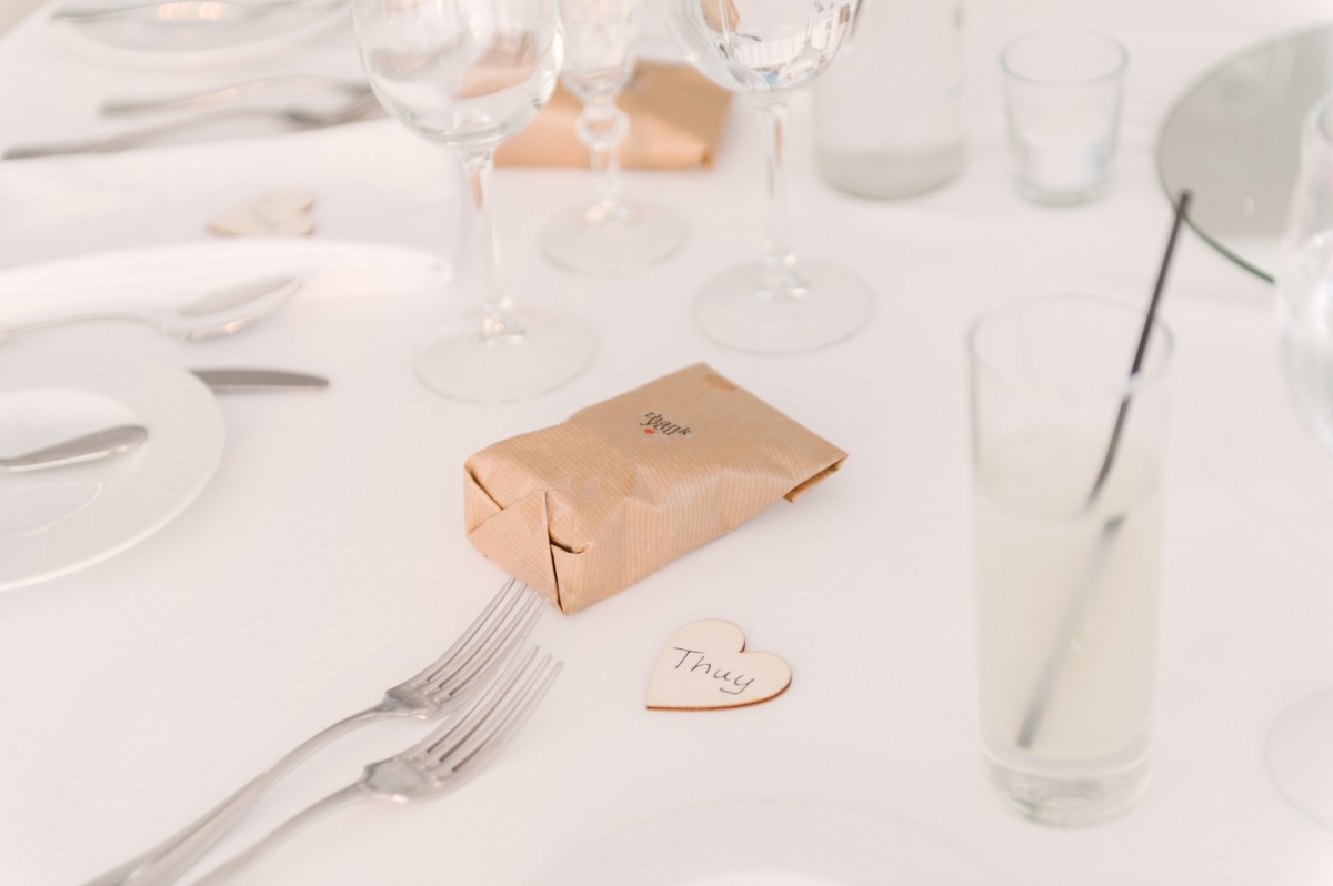 Elegant wedding table setting with place setting and gift